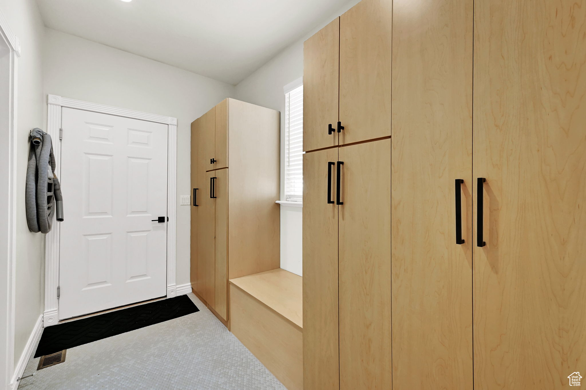 Interior space featuring penny tile patterned floors