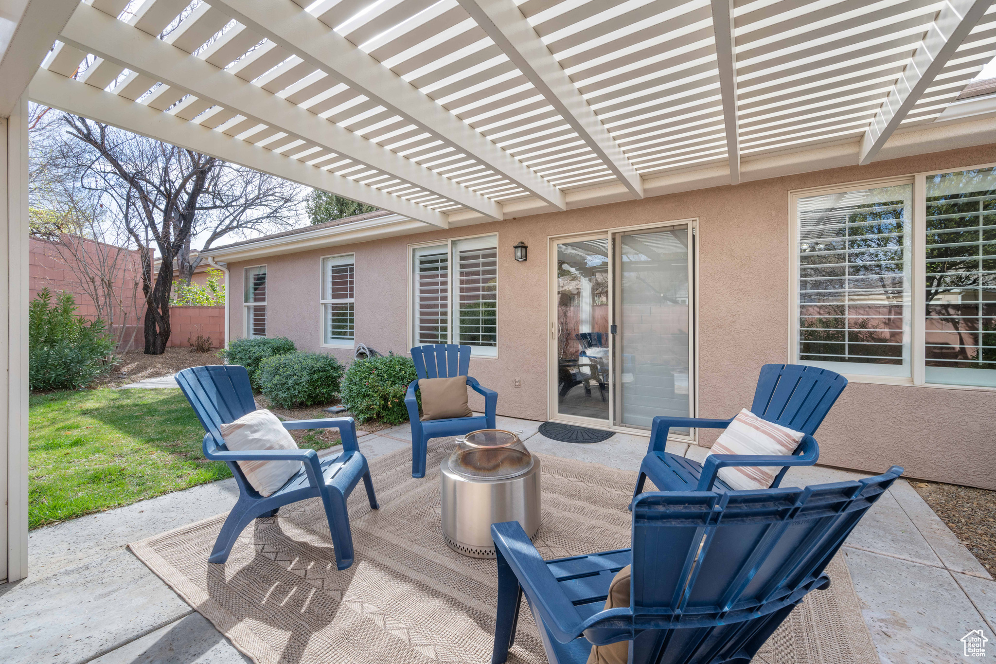 View of patio / terrace with a pergola and fence