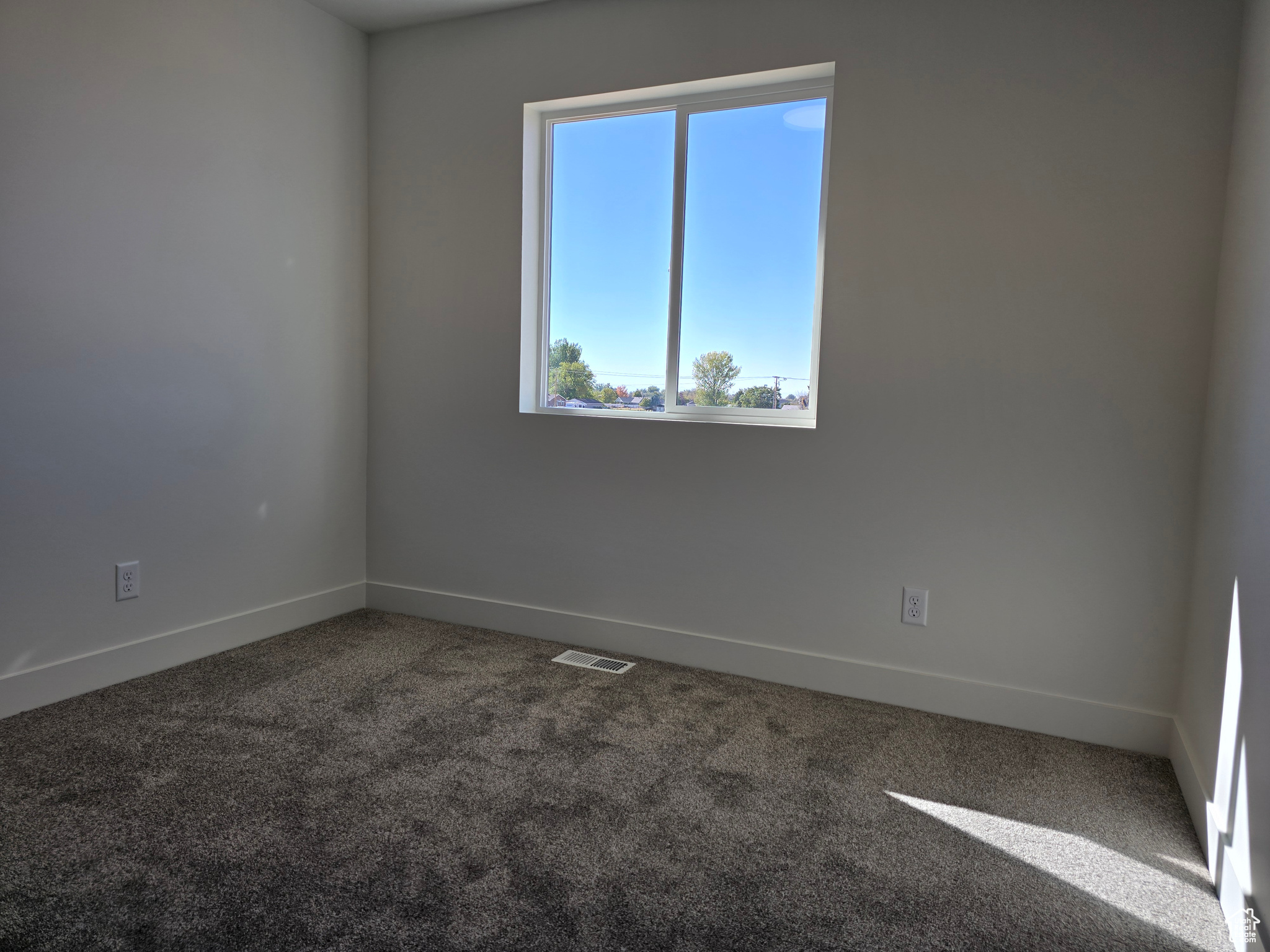 Spare room with carpet