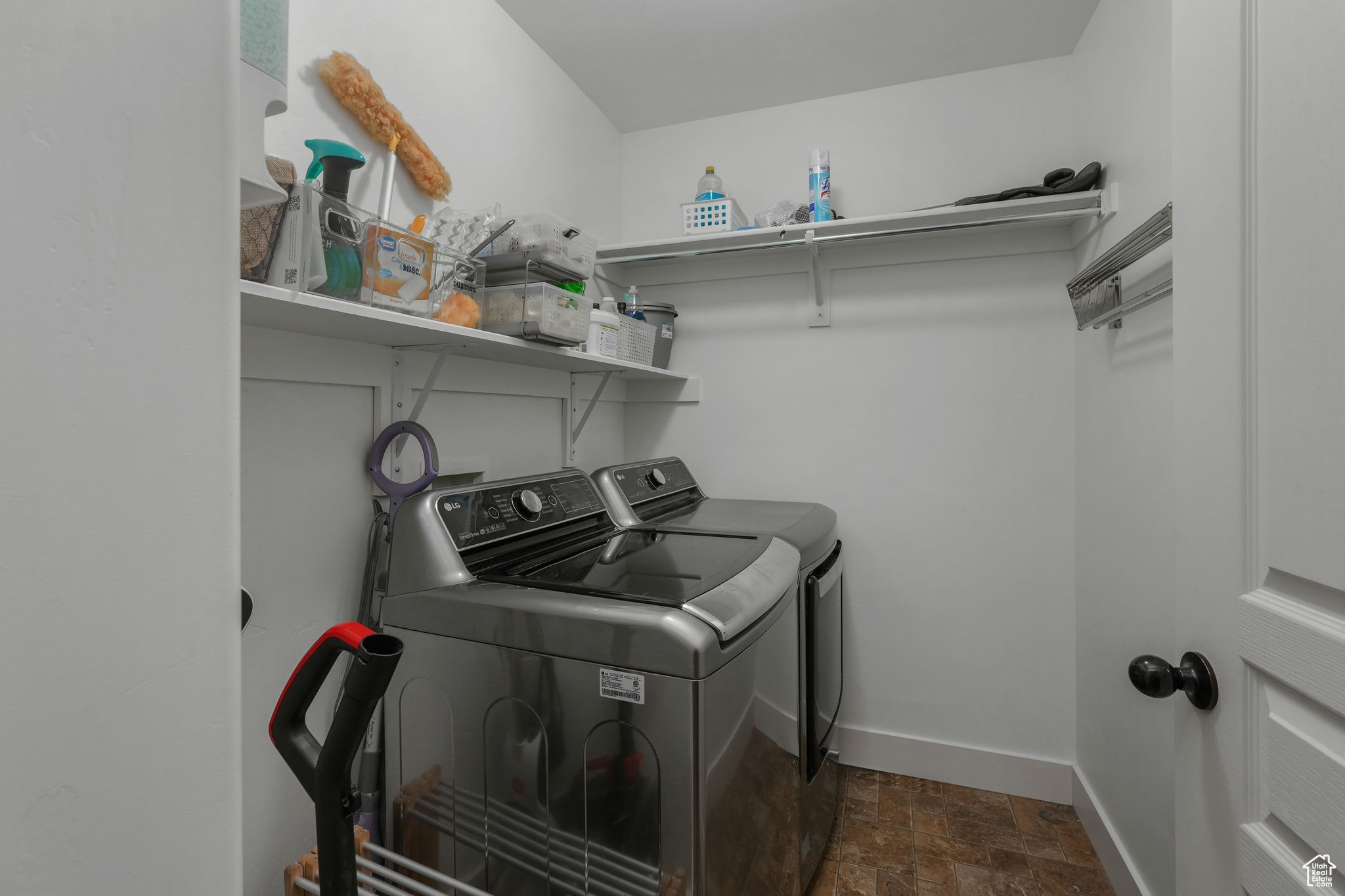 Laundry area featuring independent washer and dryer