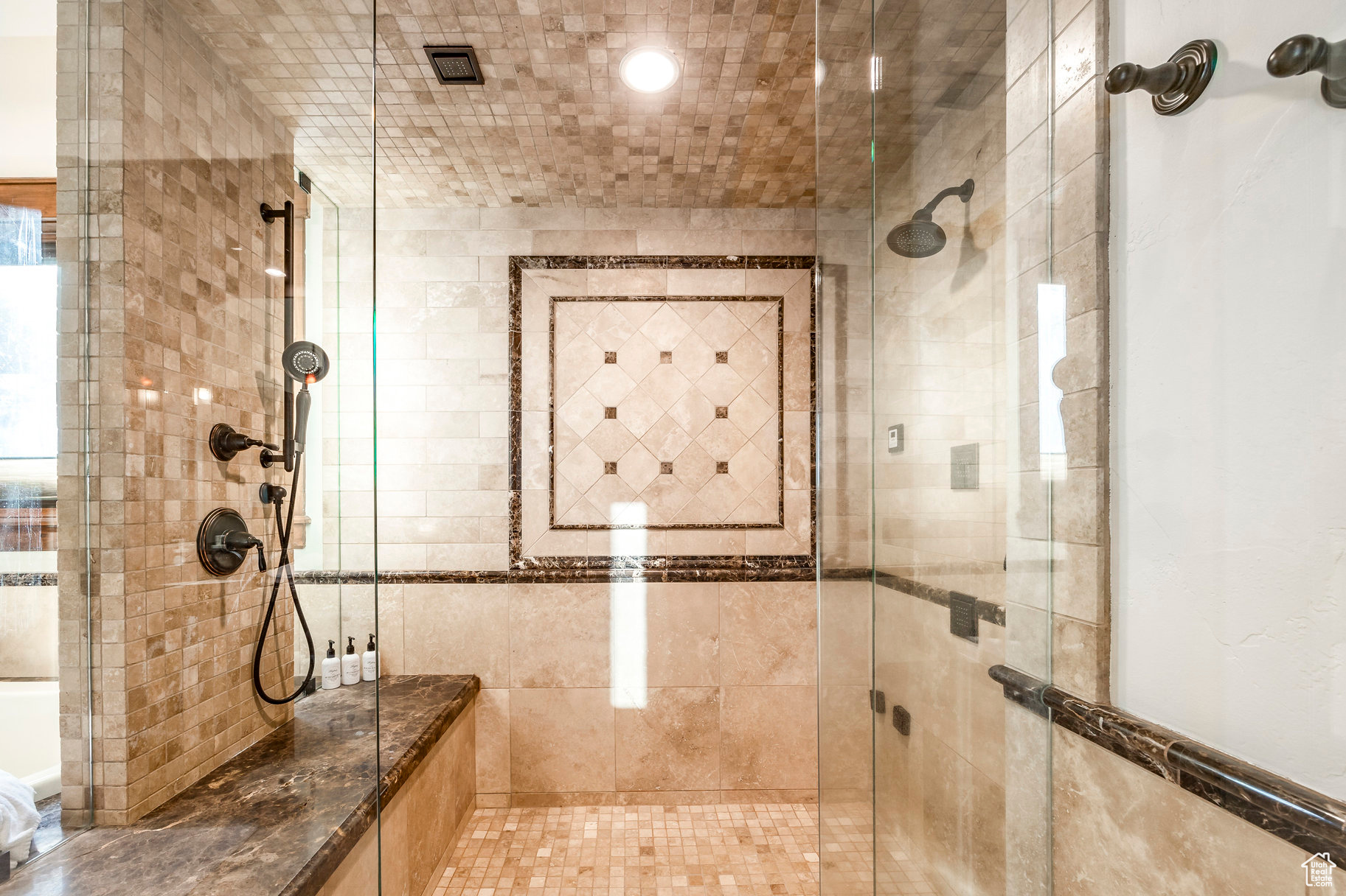 Bathroom featuring walk in shower