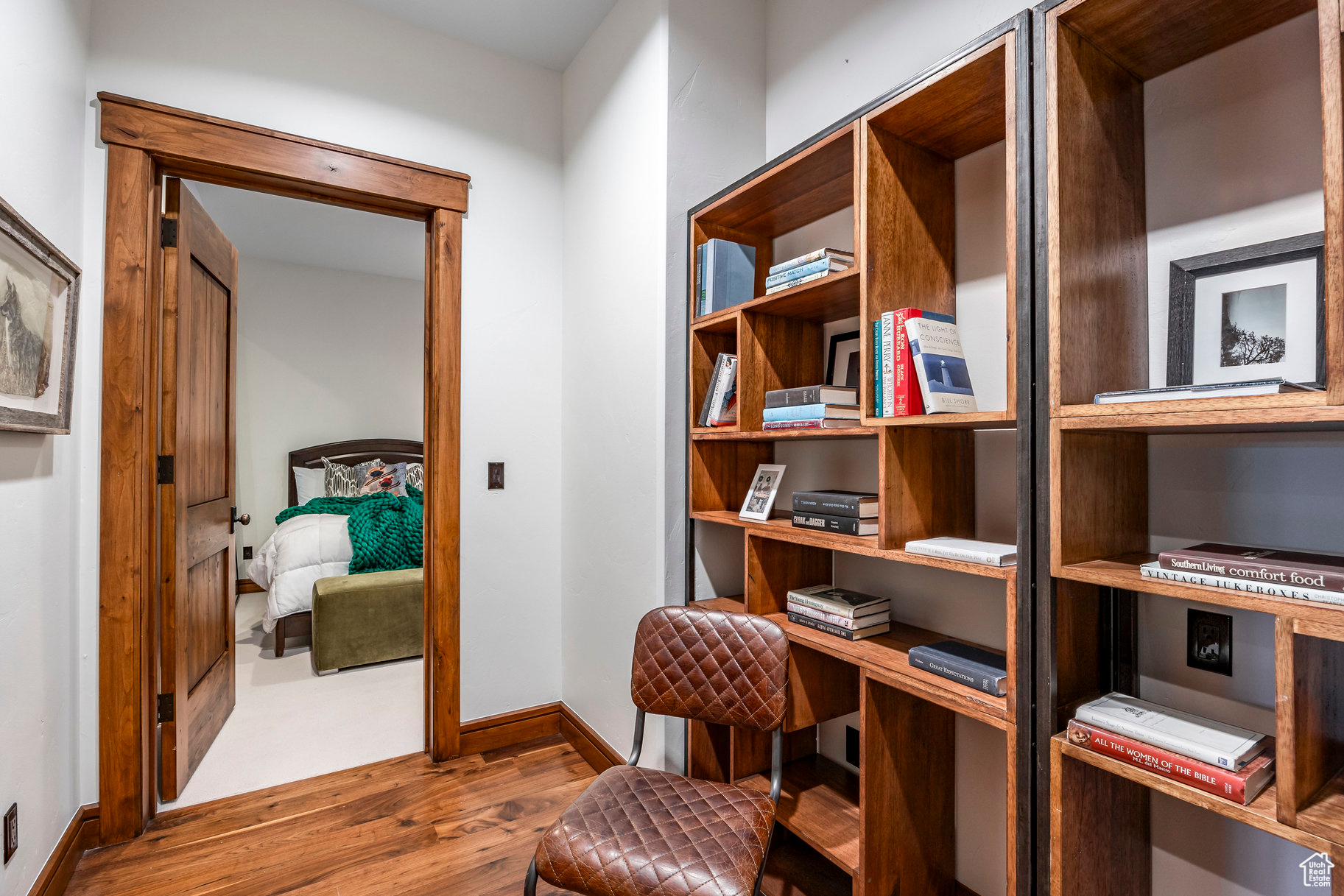 Living area with hardwood / wood-style floors