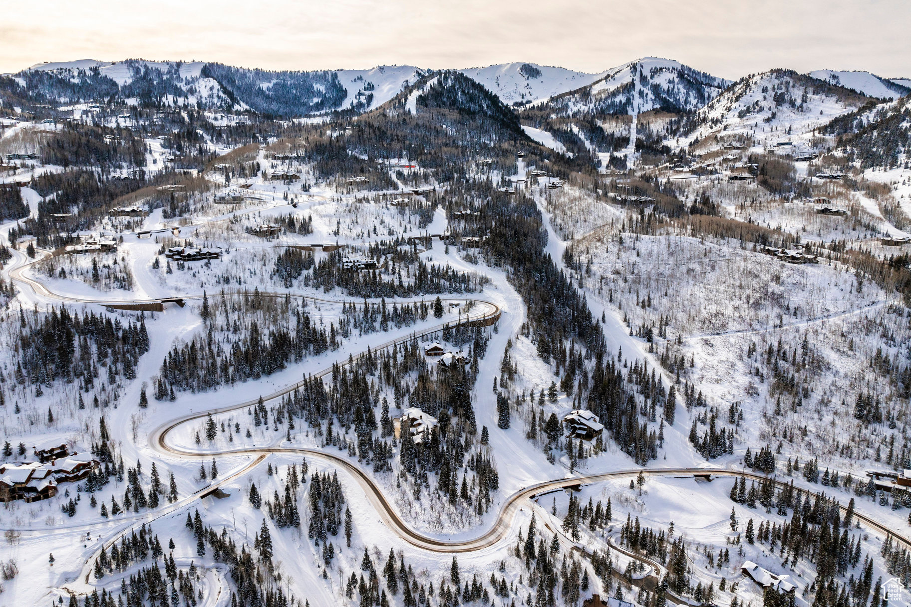 Snowy aerial view with a mountain view