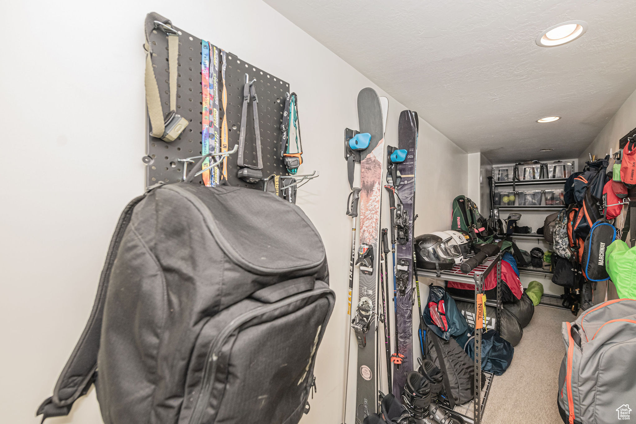 Spacious closet with carpet flooring