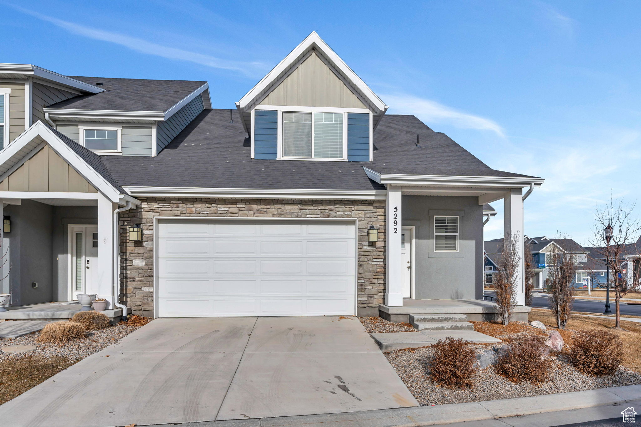 View of front of property with a garage