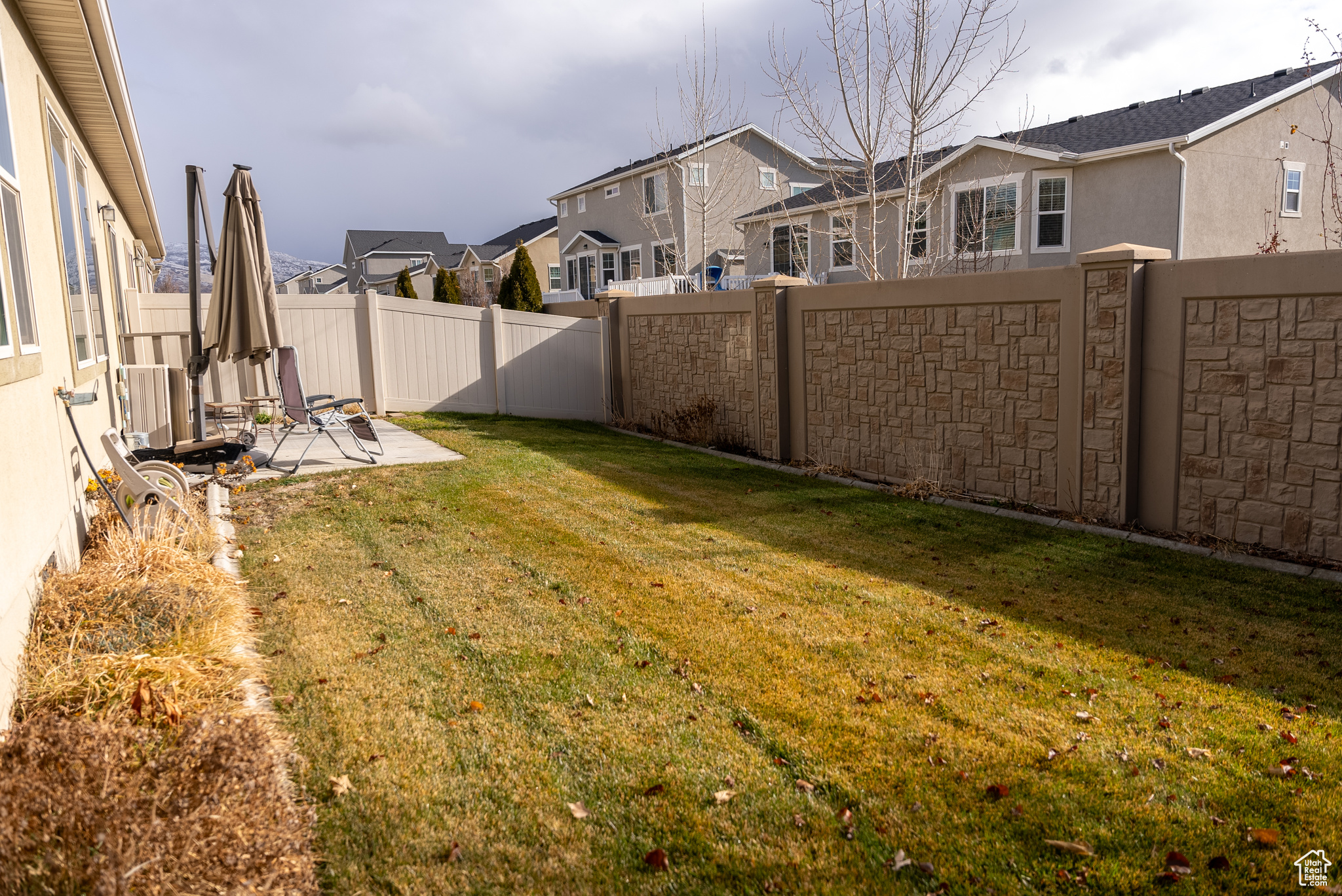 View of yard with a patio