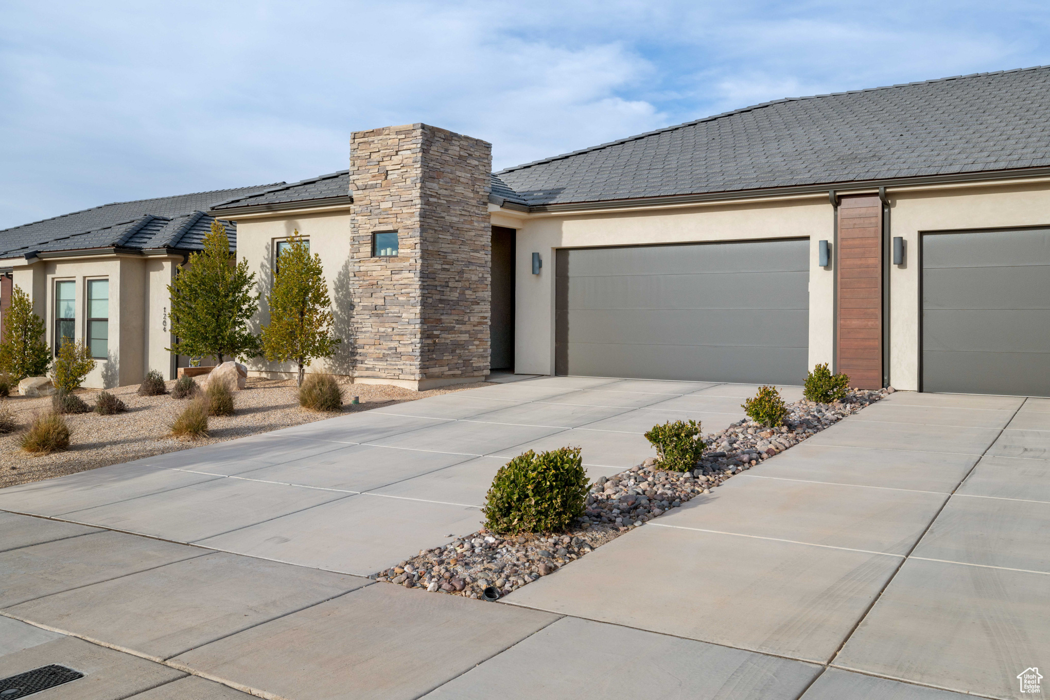View of front of home featuring a garage