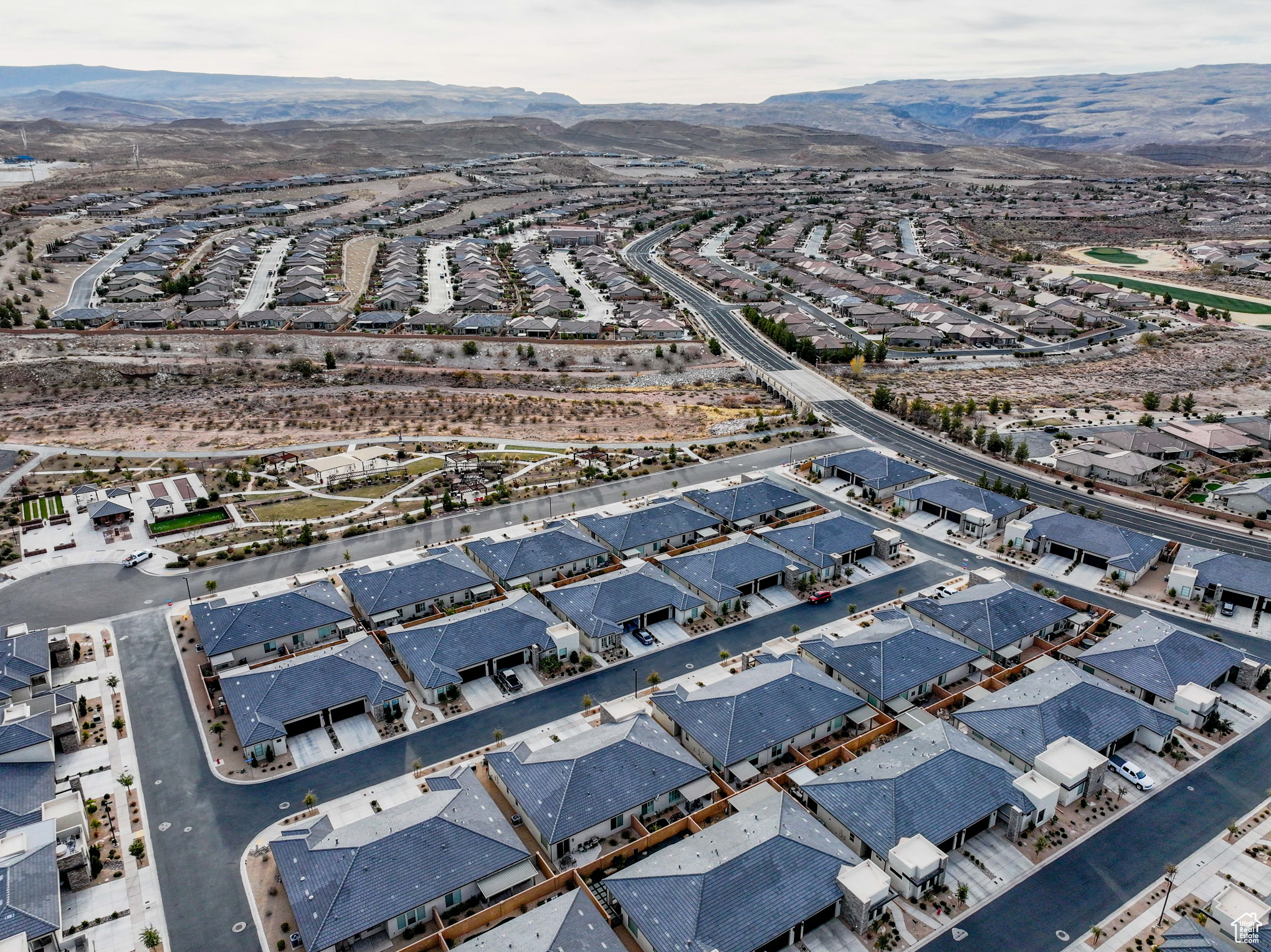 Birds eye view of property with a mountain view
