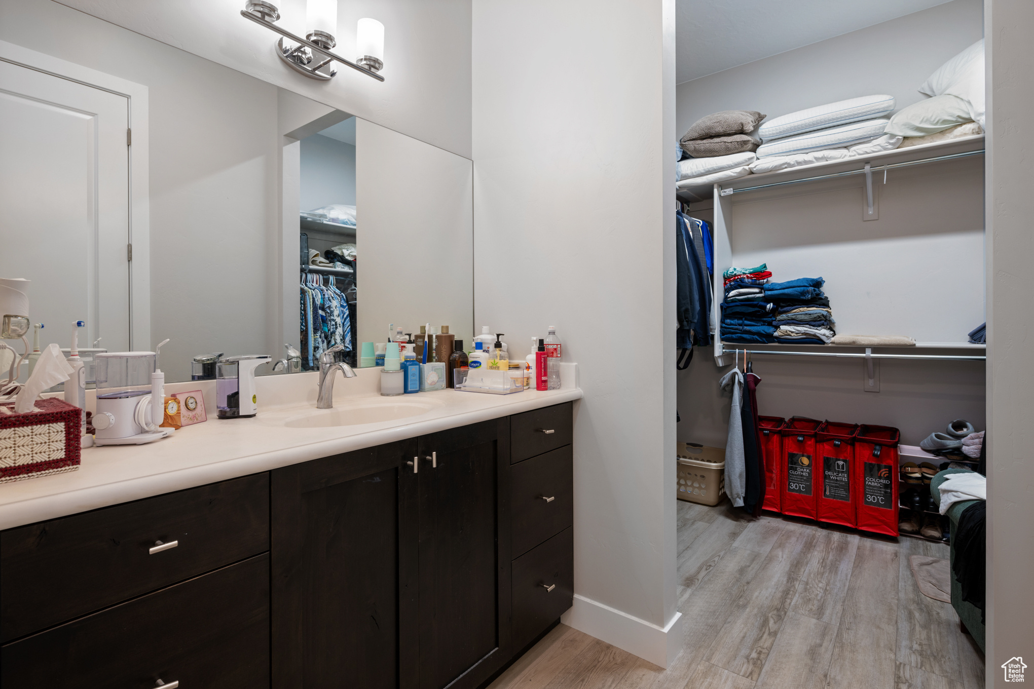 Bathroom featuring vanity and hardwood / wood-style flooring
