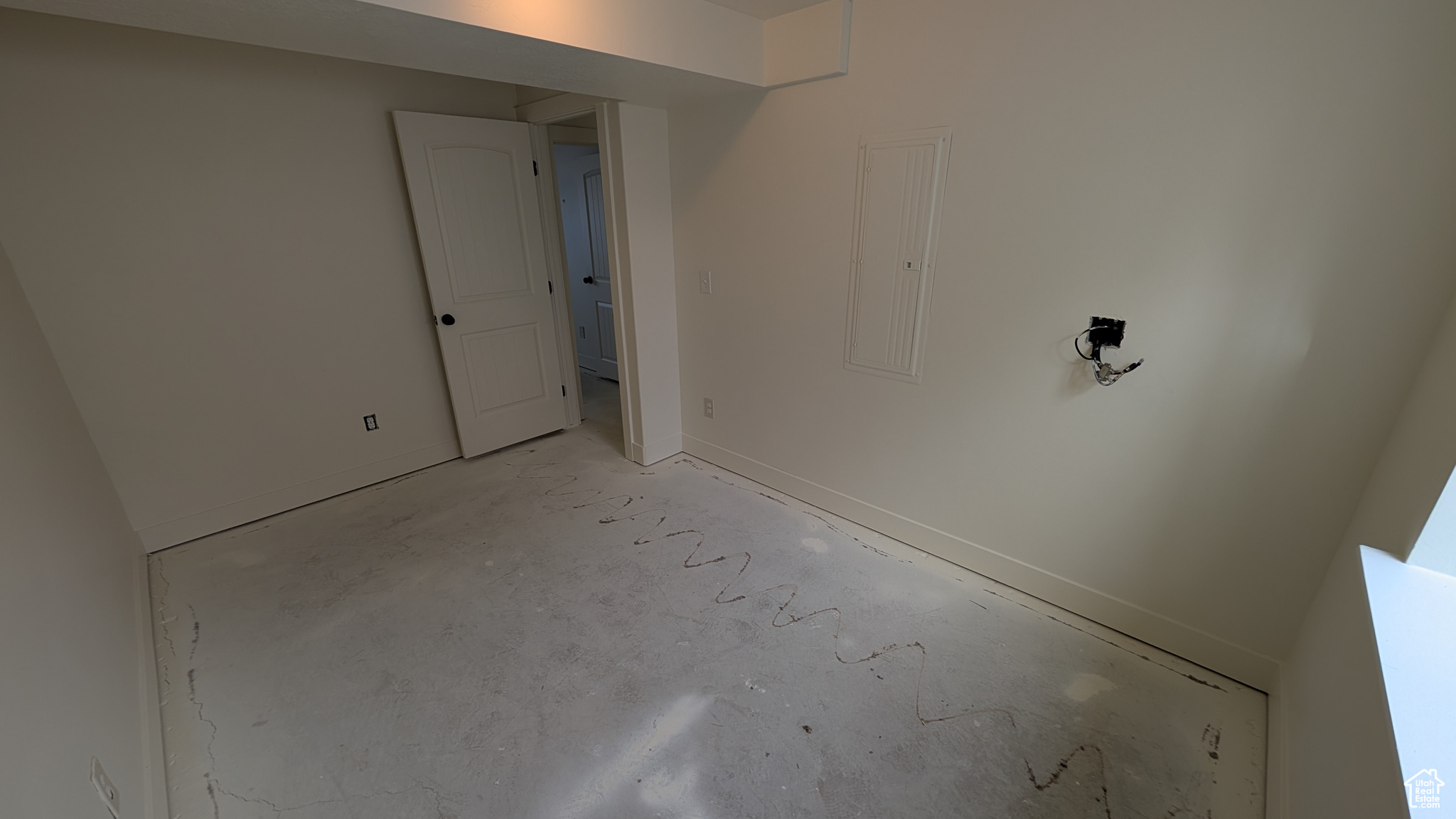 Basement featuring electric panel