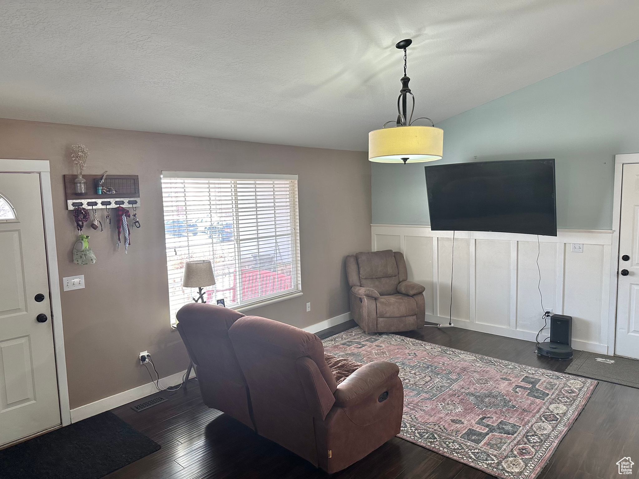 Living room featuring dark hardwood / wood-style flooring