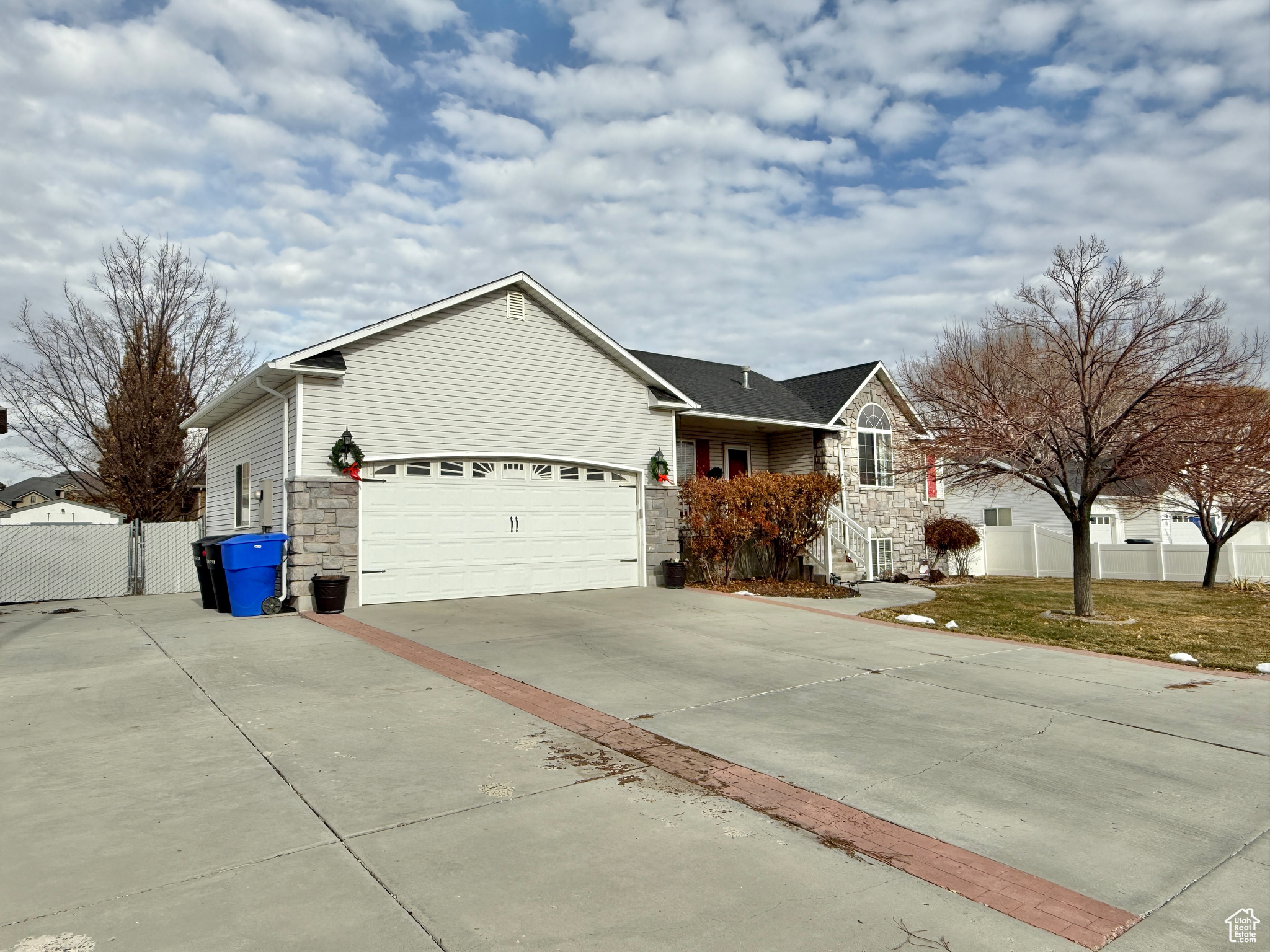 Ranch-style home featuring a garage