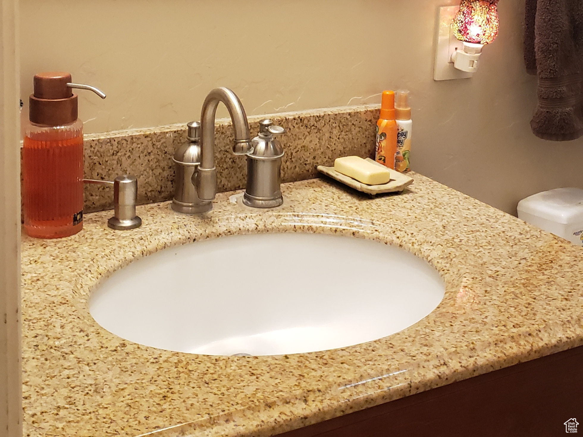 Bathroom featuring toilet, vanity and tub/shower.