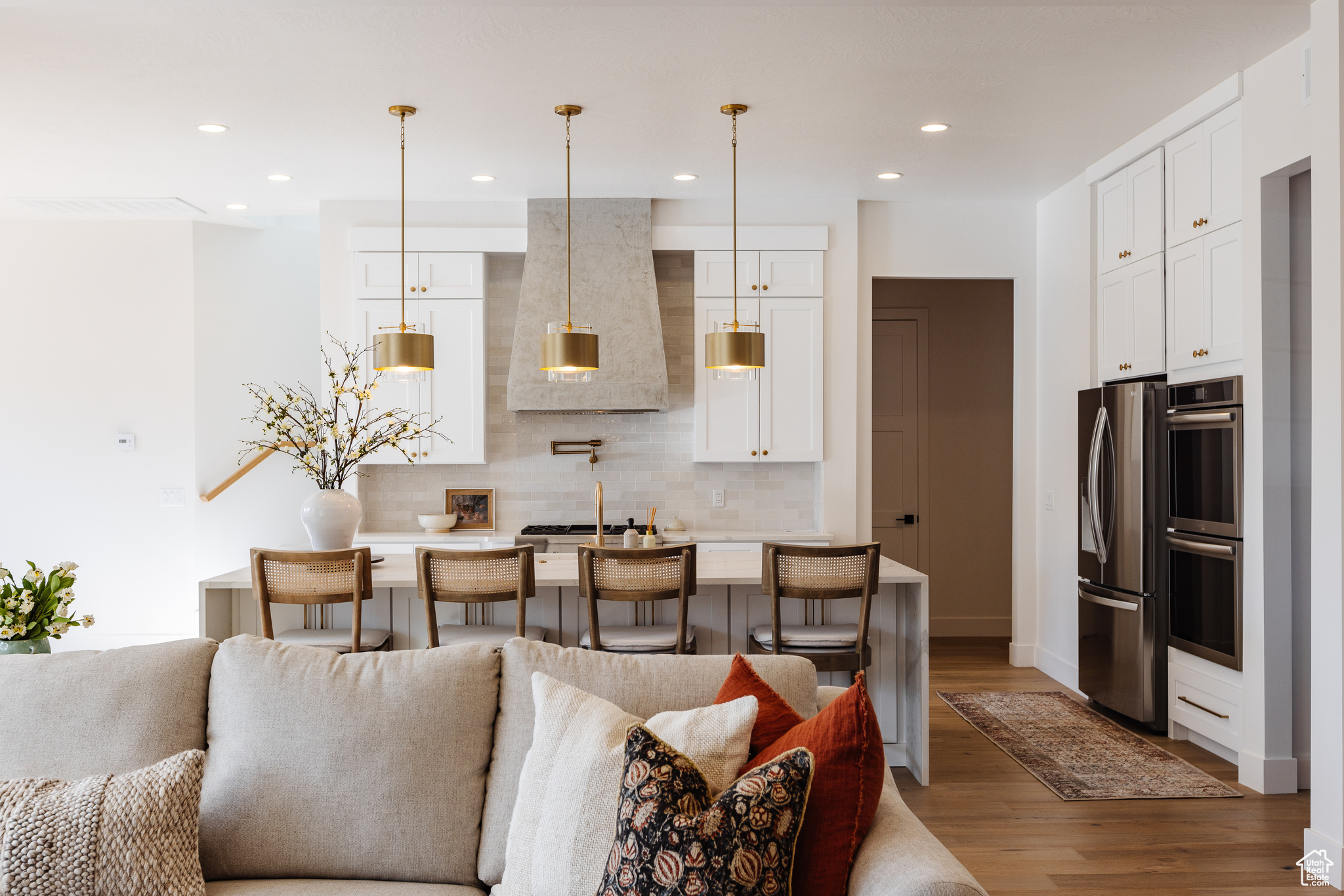 Living room with hardwood / wood-style flooring