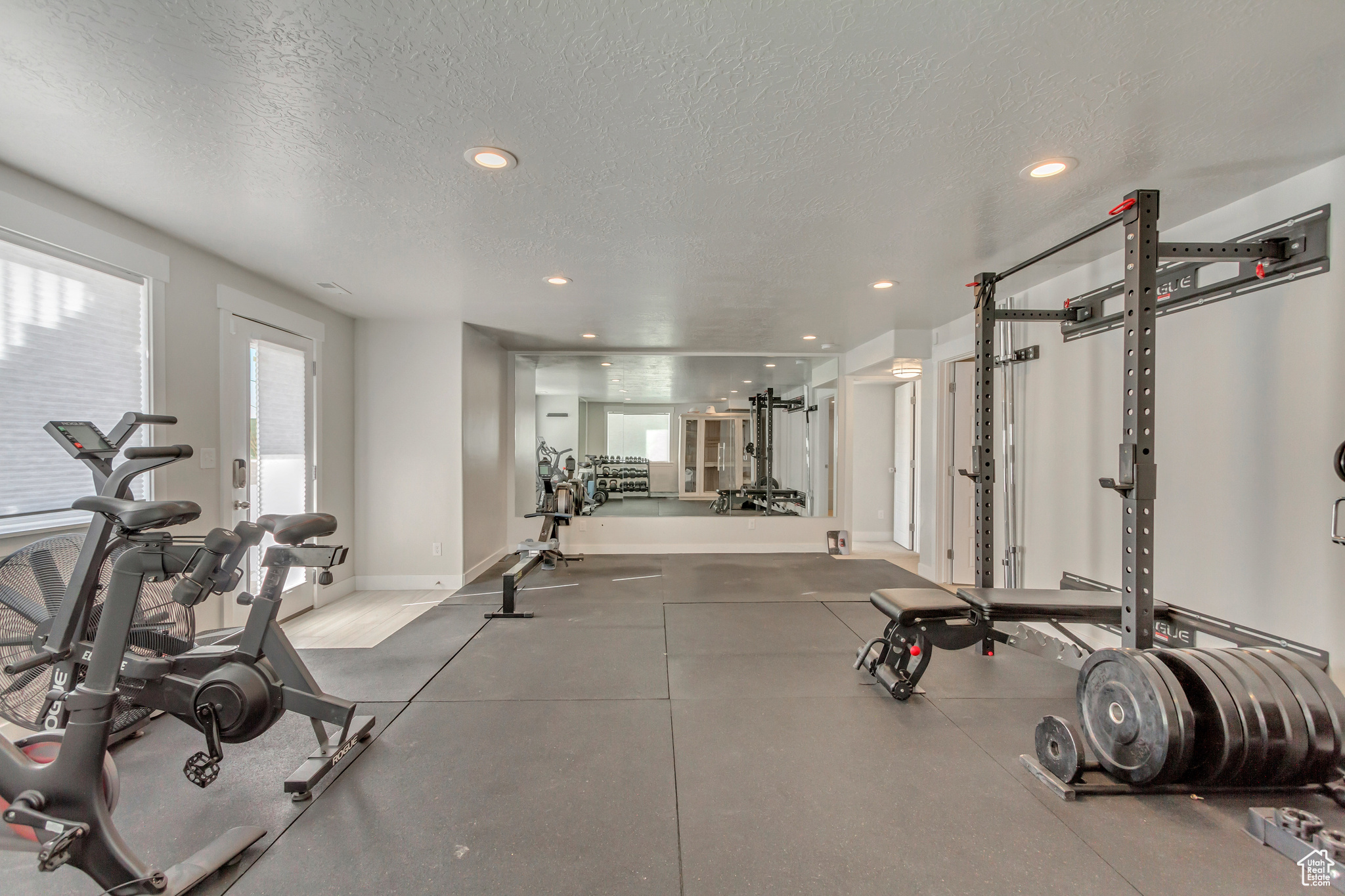 Gym with a textured ceiling