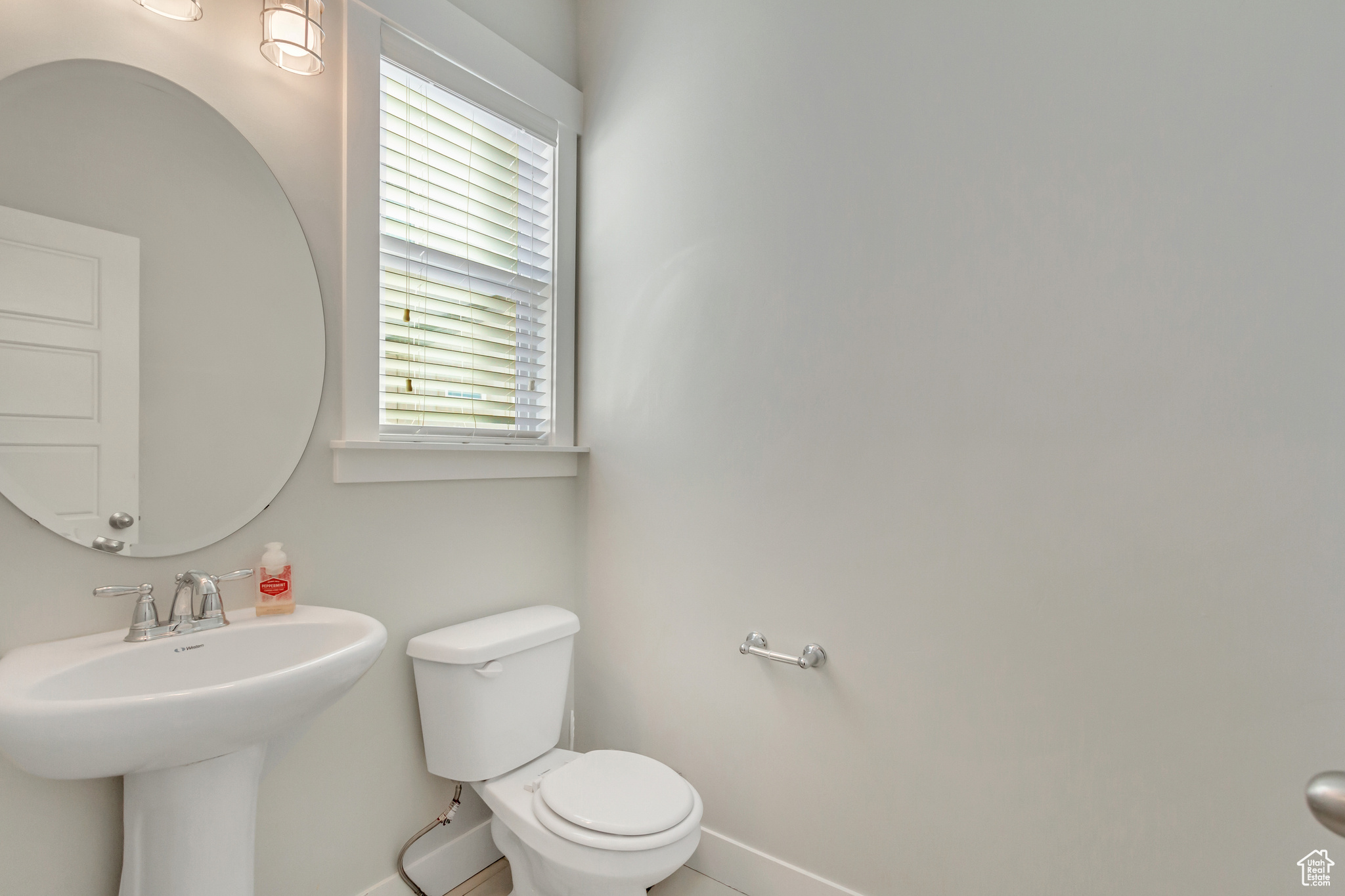 Bathroom featuring toilet and sink