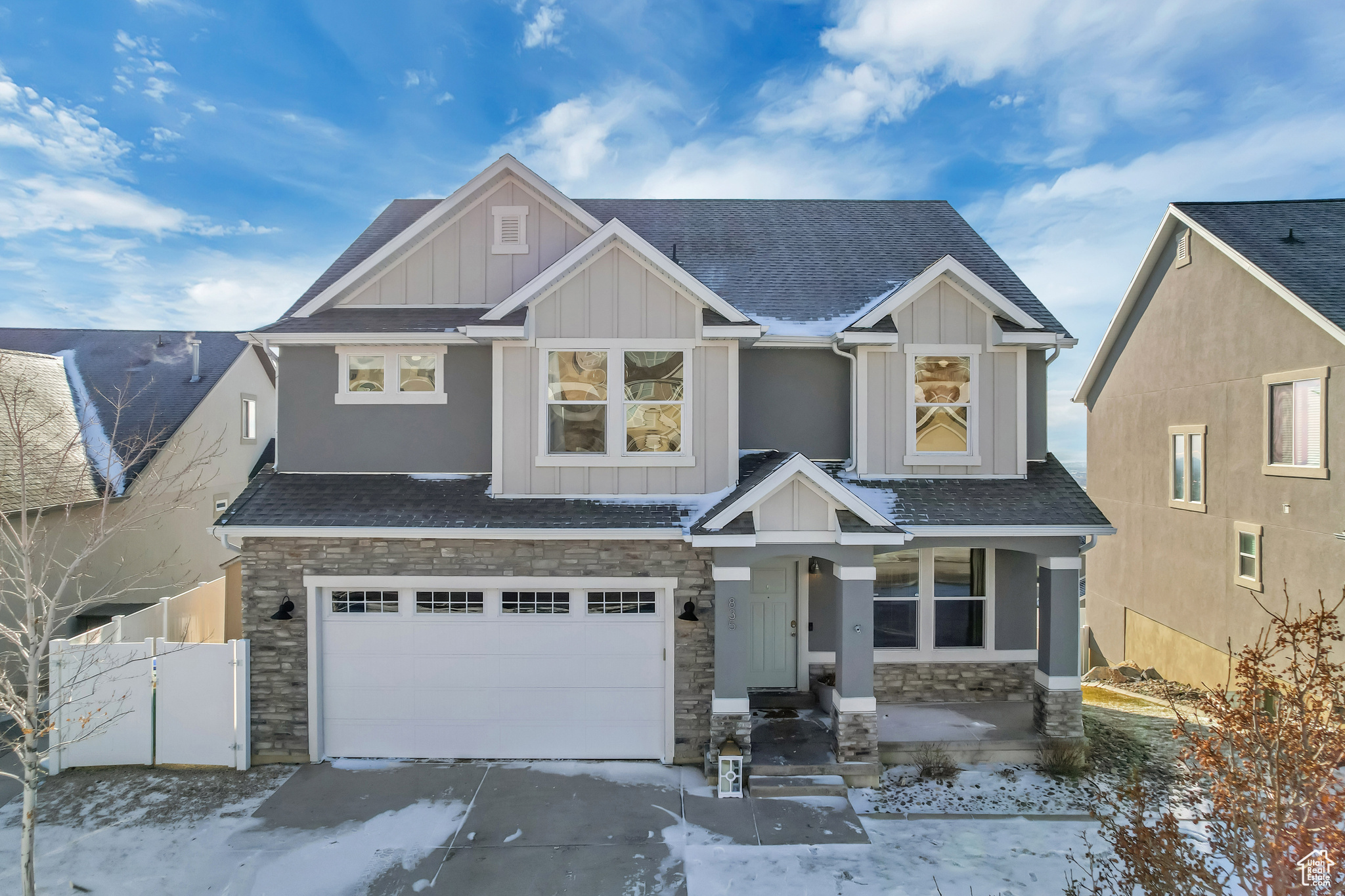 Craftsman-style house featuring a garage