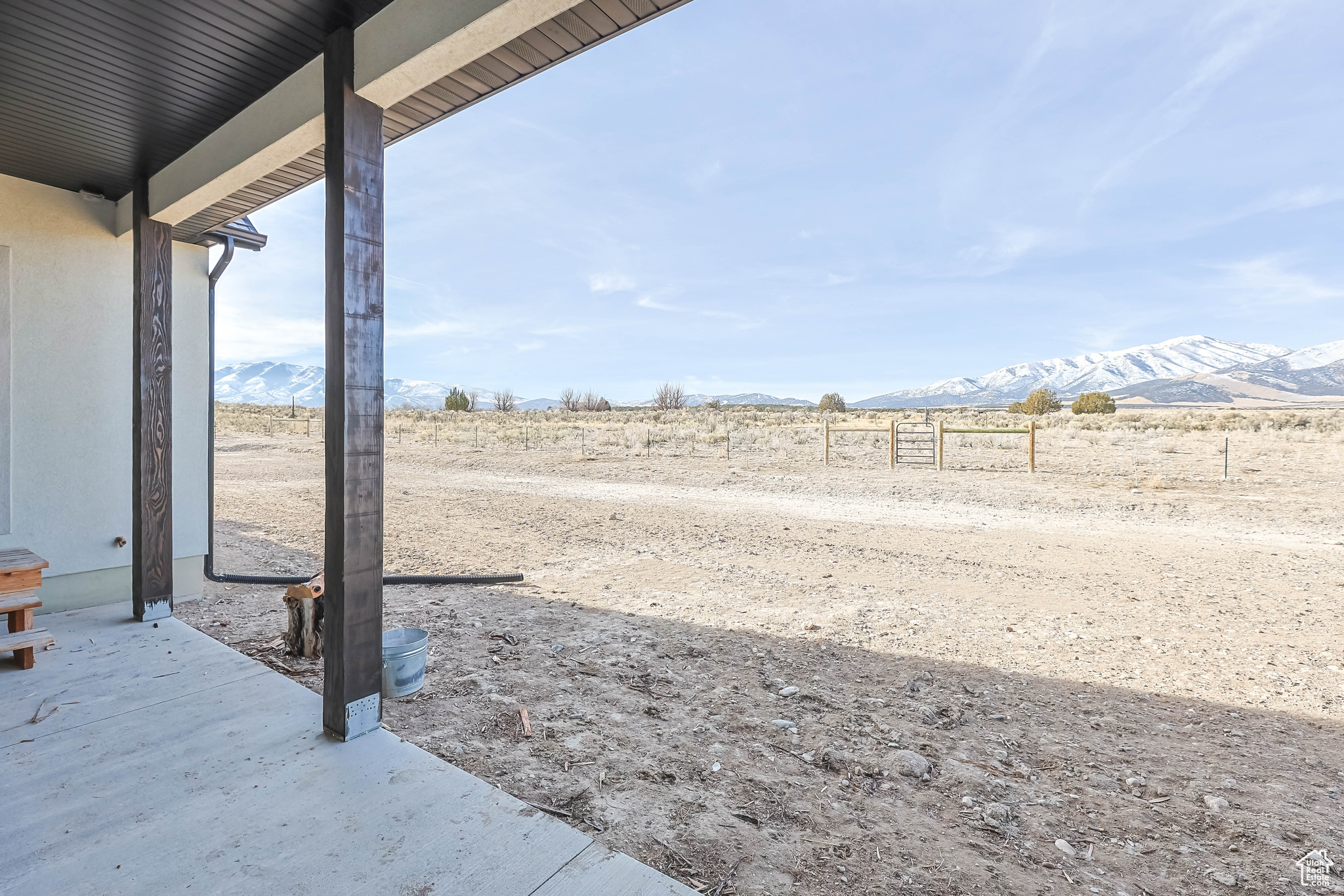 View of yard featuring a patio area, a mountain view, and a rural view