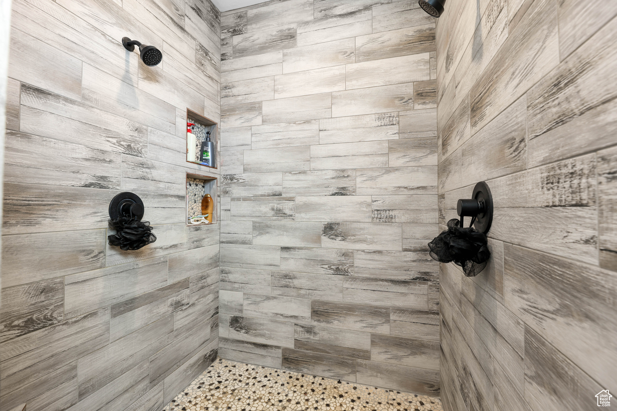 Bathroom featuring tiled shower