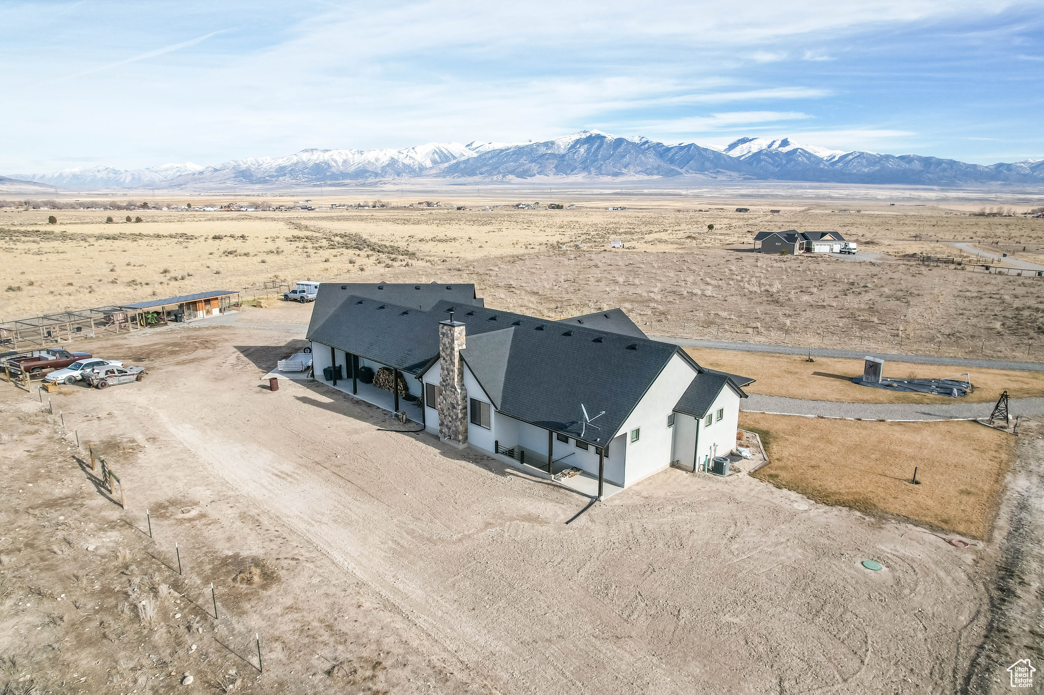 Birds eye view of property with a mountain view and a rural view