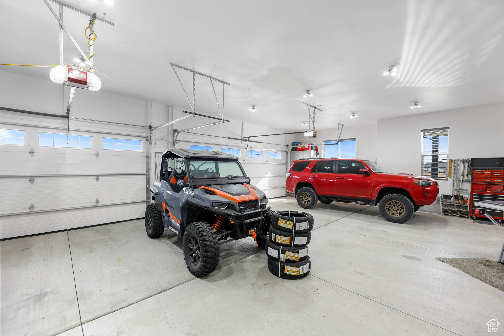 Garage featuring a garage door opener