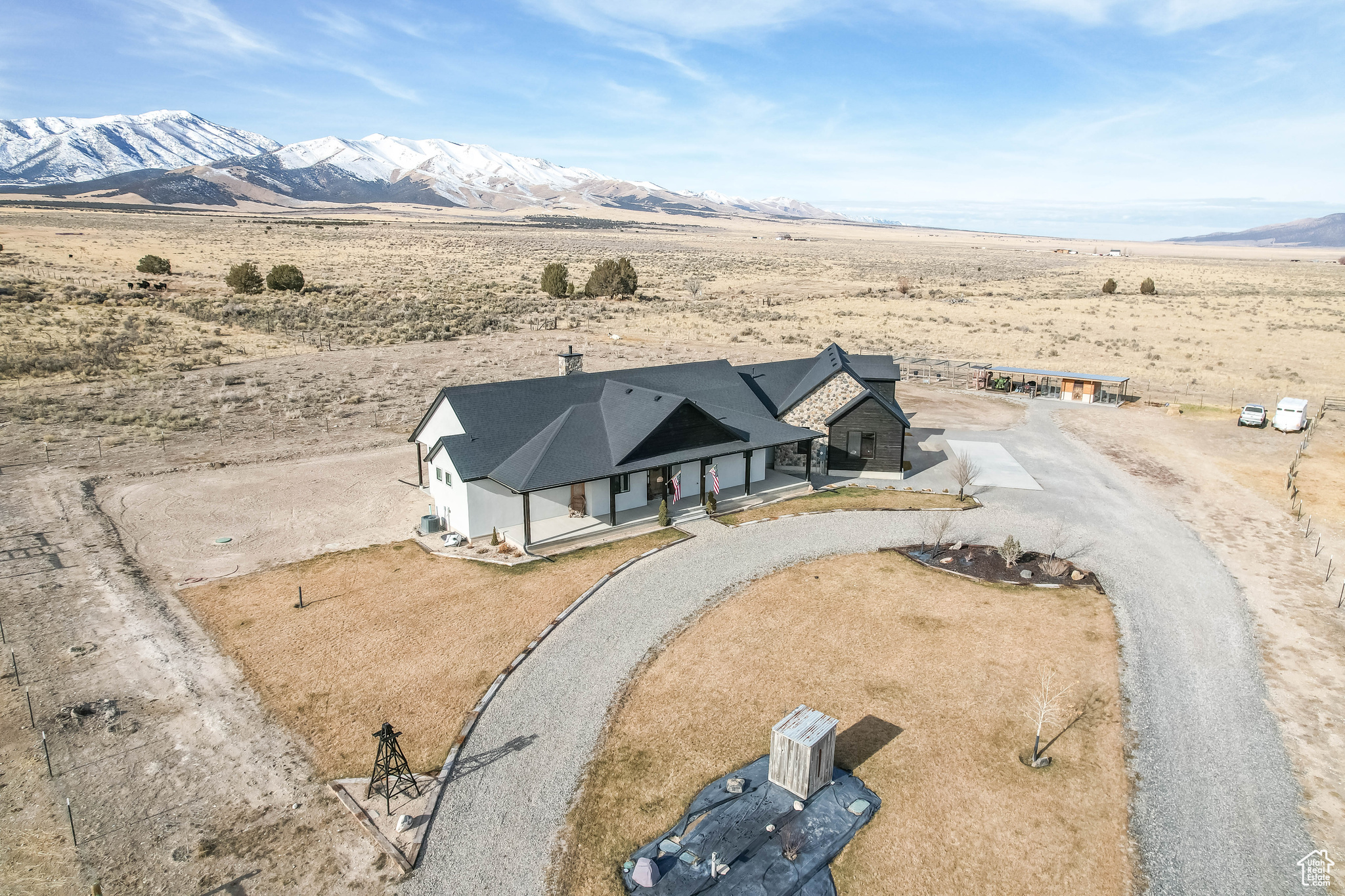 Birds eye view of property with a mountain view