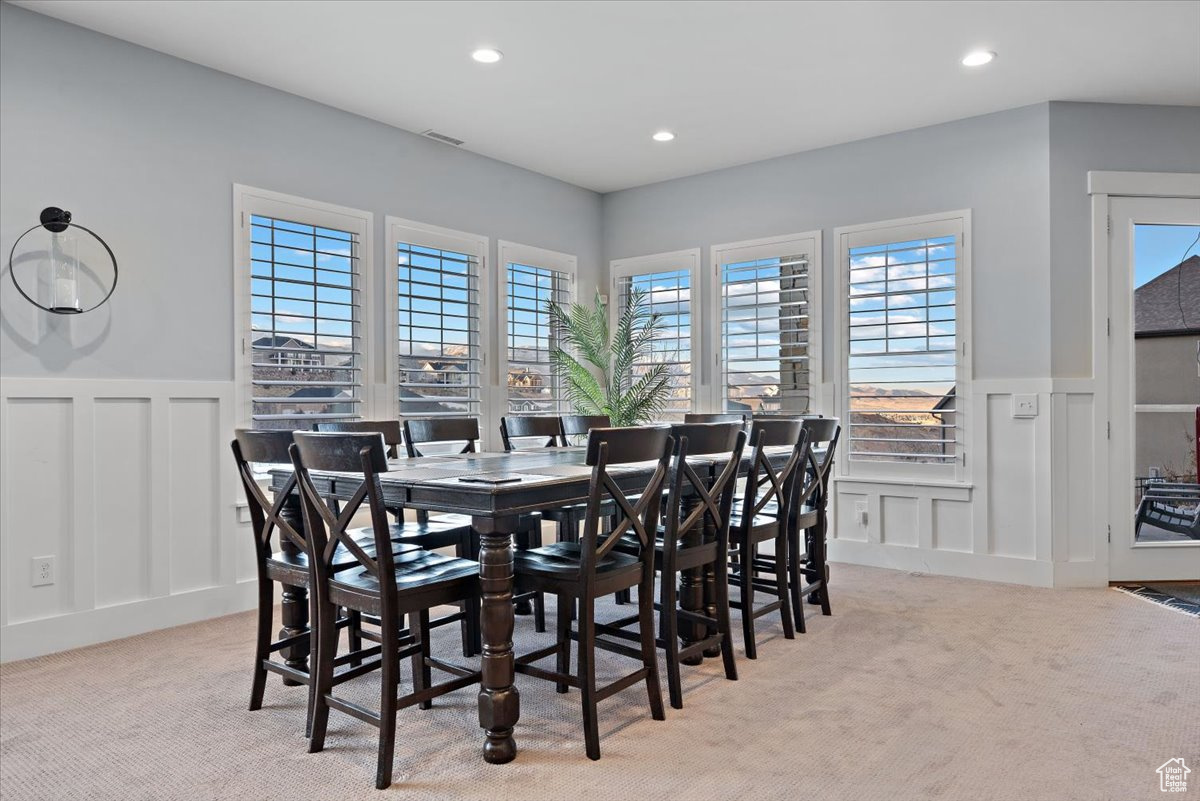 View of carpeted dining area