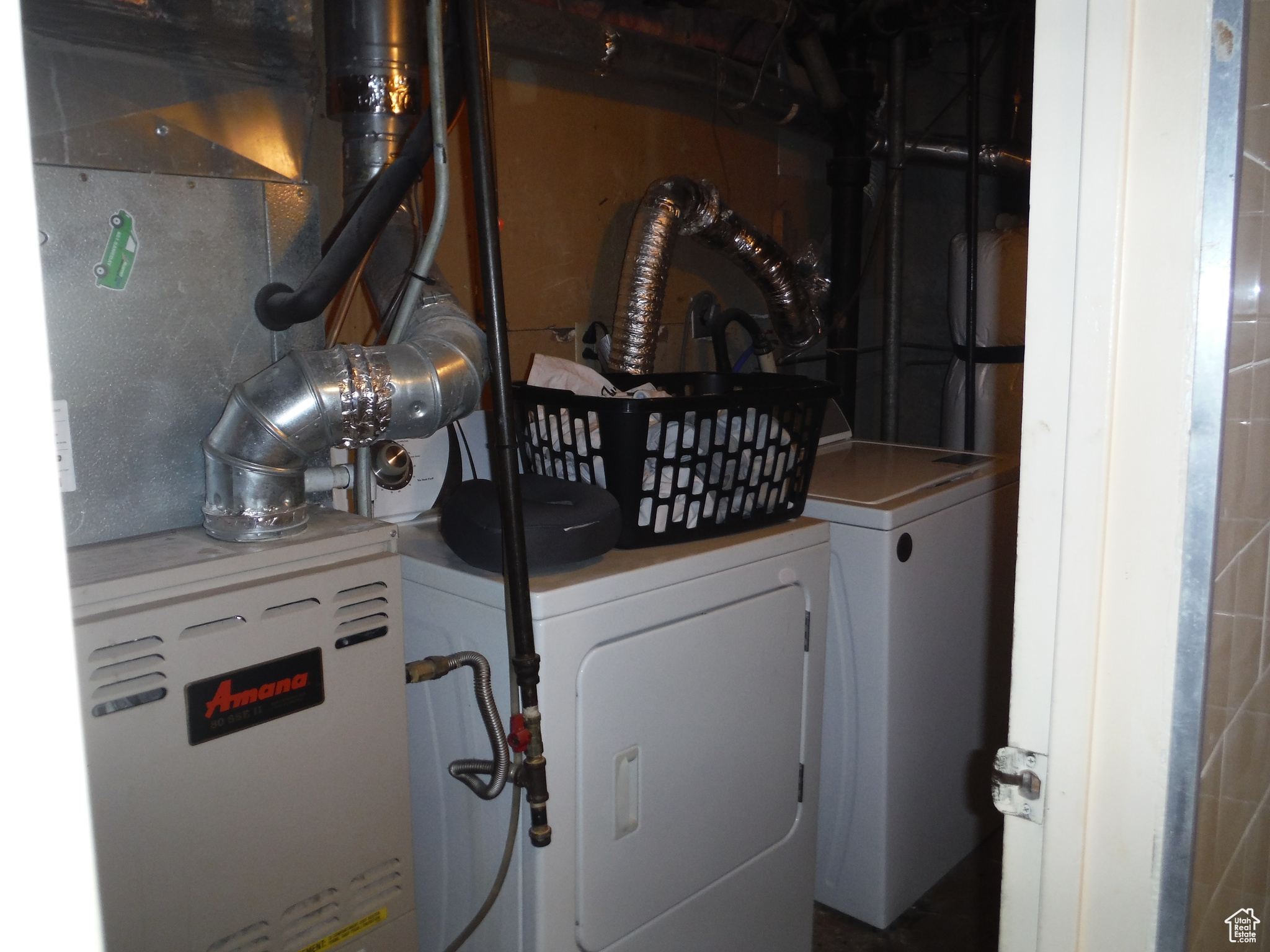 Laundry area with separate washer and dryer