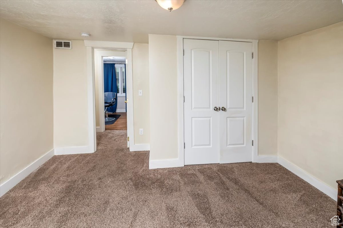Lower level area with bedroom, salon and restroom with separate entrance.