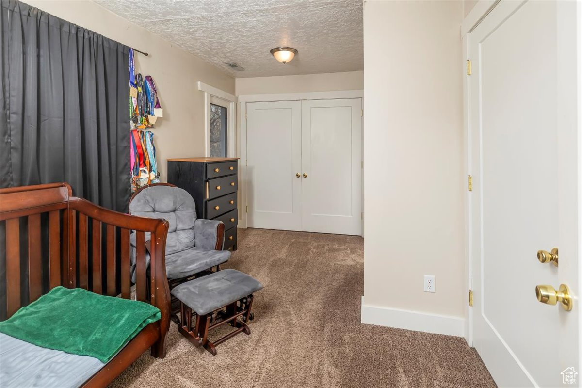 Attached bedroom to the primary suite.