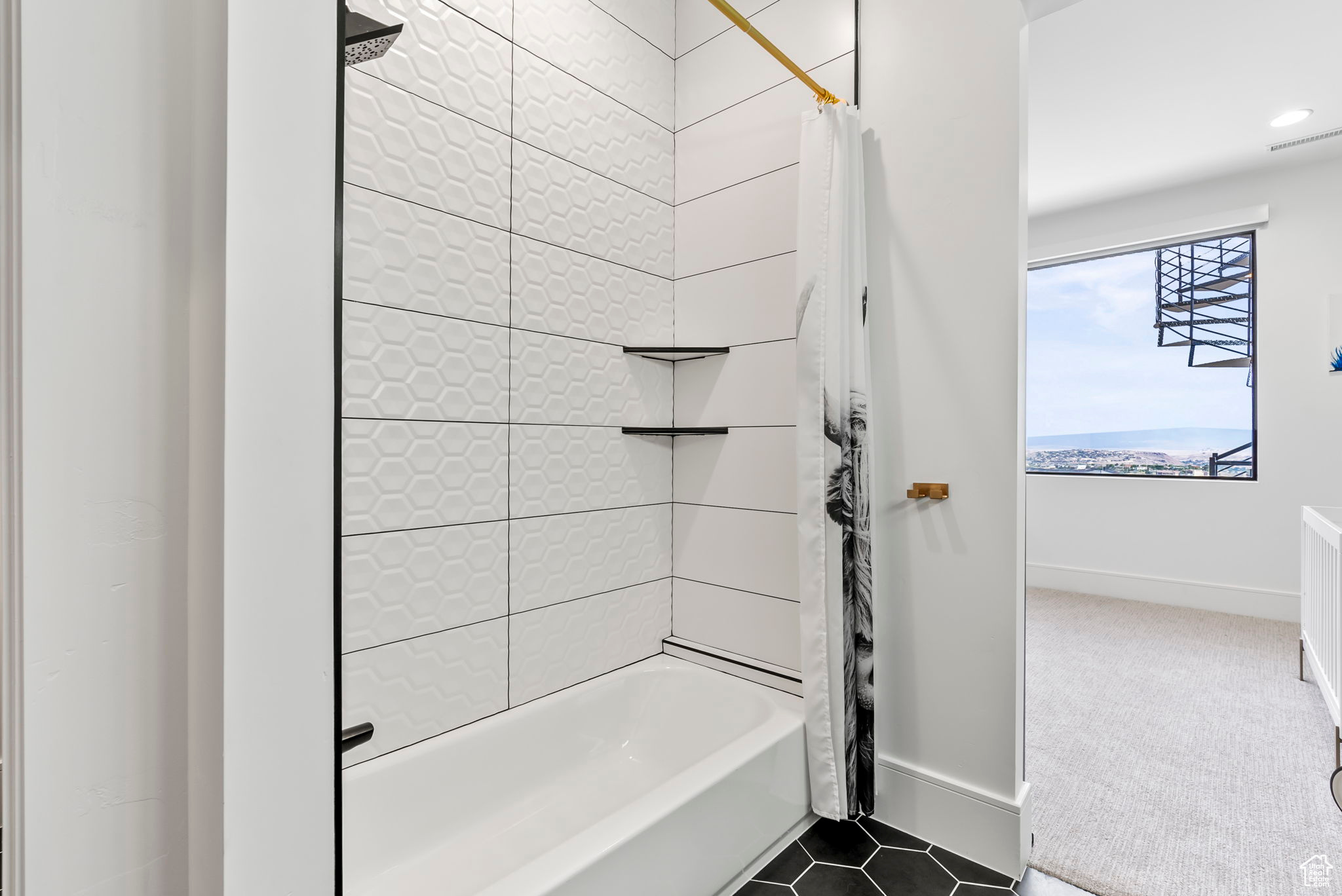 Bathroom with shower / bath combination with curtain and tile patterned floors