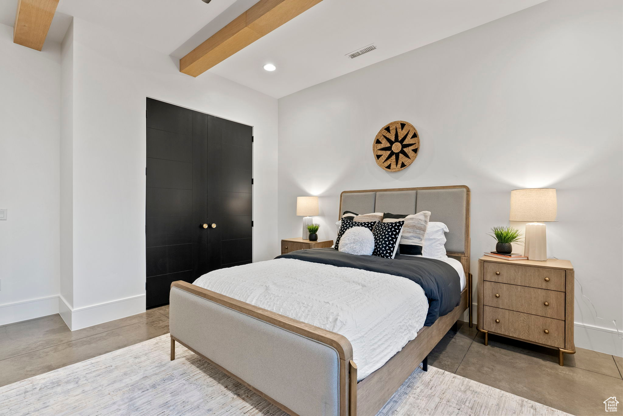 Bedroom with beamed ceiling