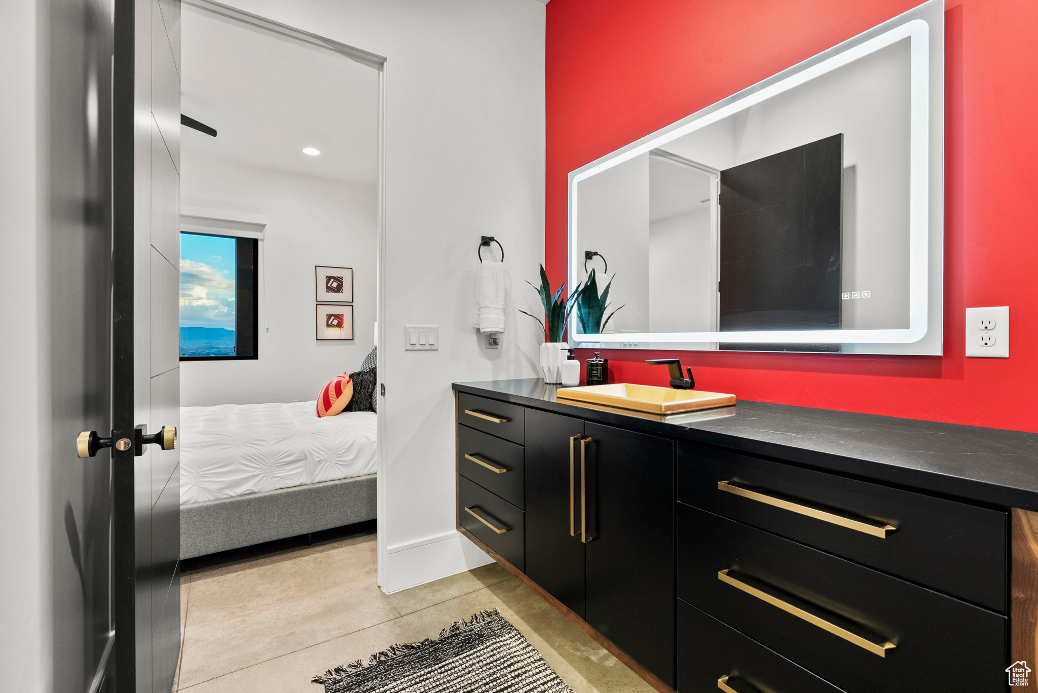 Bathroom featuring tile patterned floors and vanity