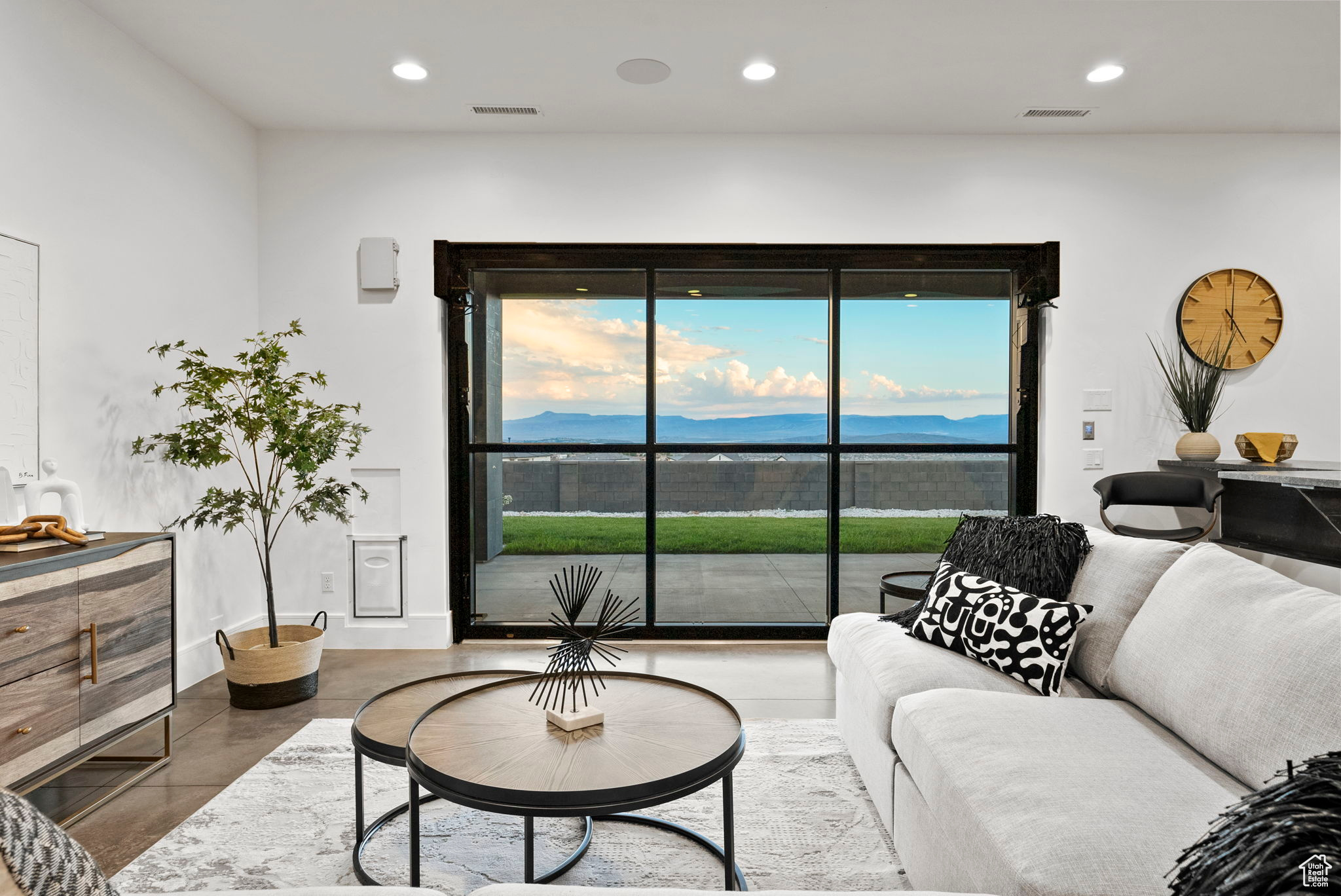 Living room with concrete flooring