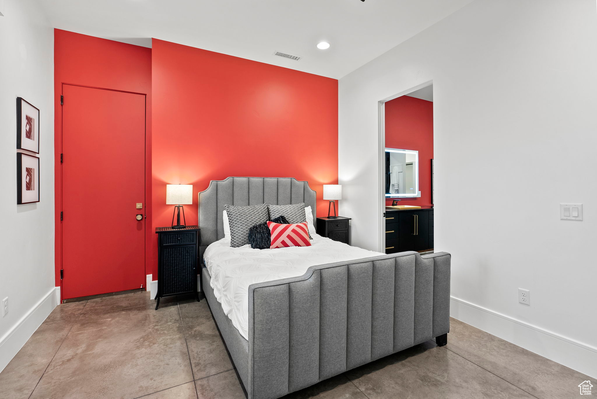 Bedroom featuring concrete flooring