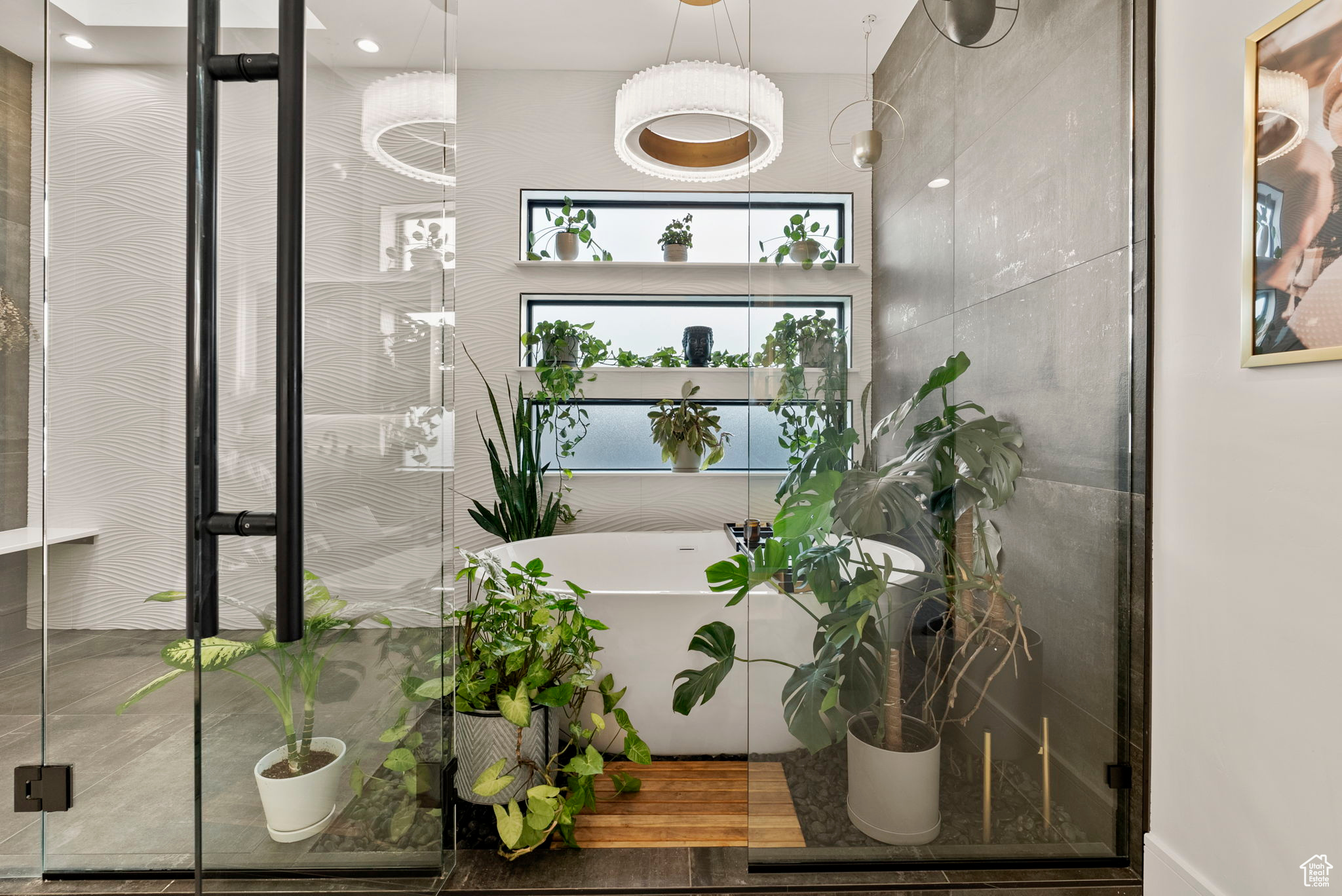 Interior space with shower with separate bathtub