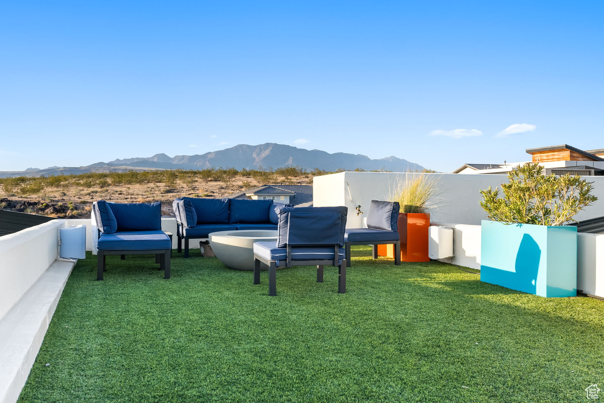 View of yard with a mountain view and an outdoor living space