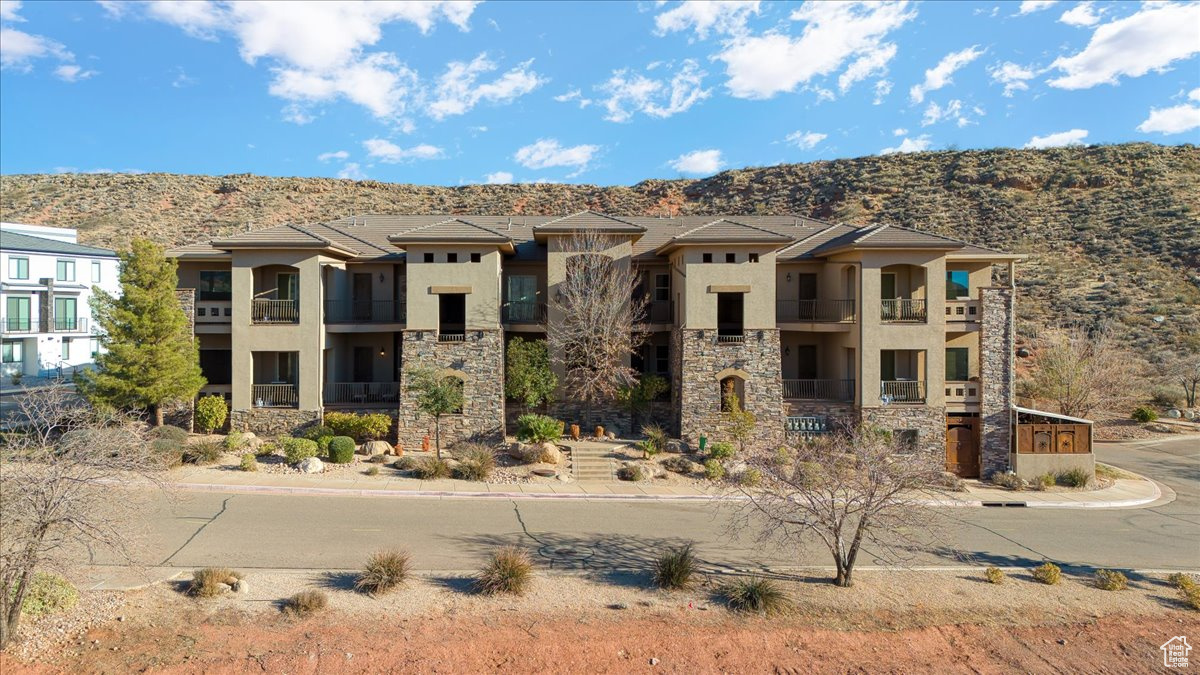 View of front of property featuring a mountain view