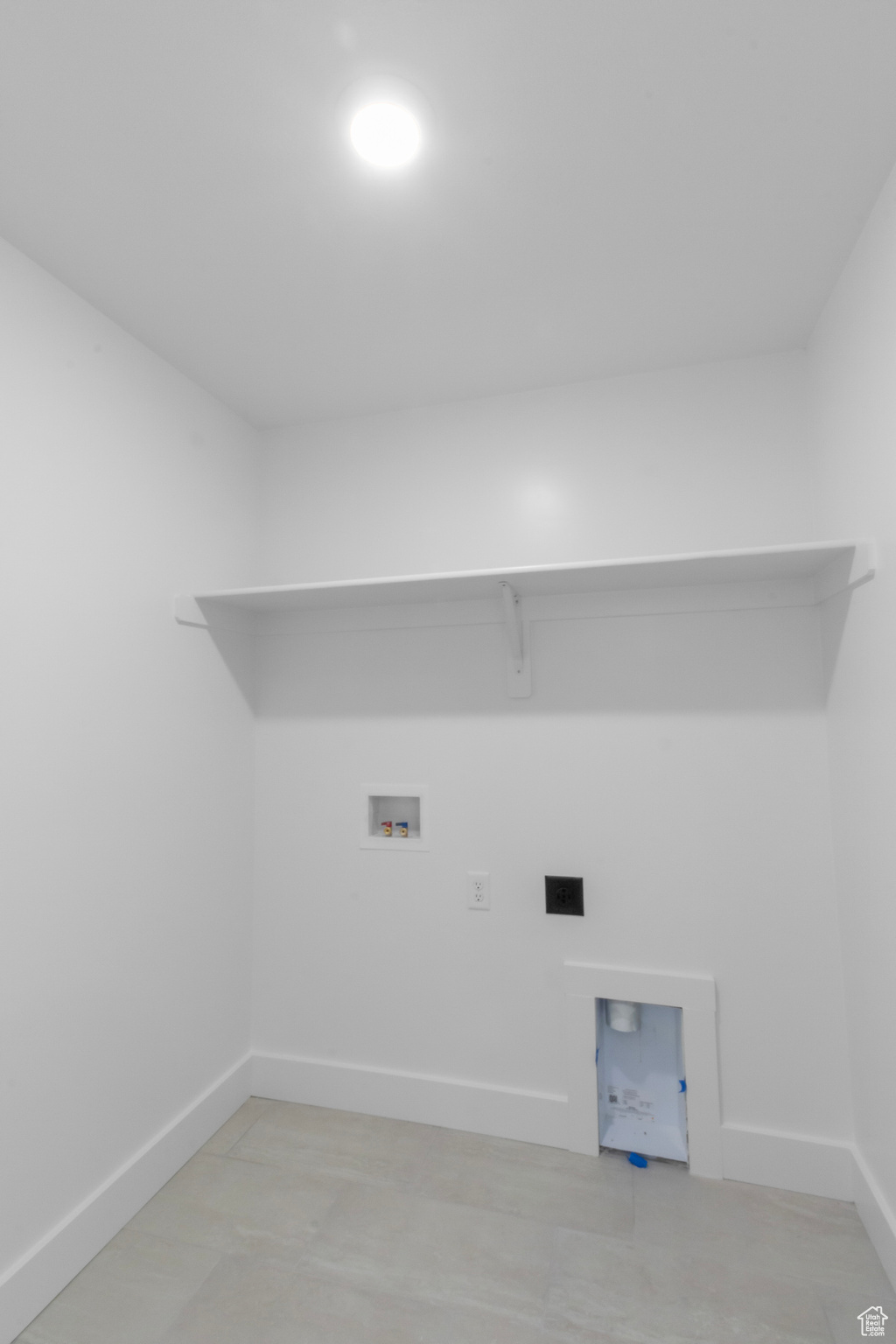 Laundry room featuring washer hookup and hookup for an electric dryer