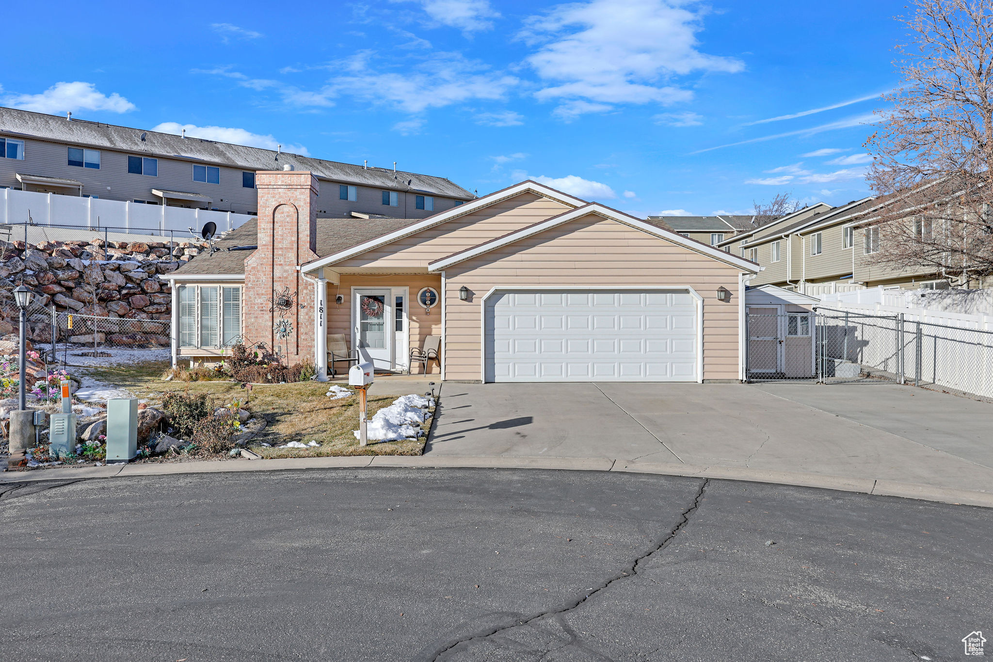 View of front of property with a garage