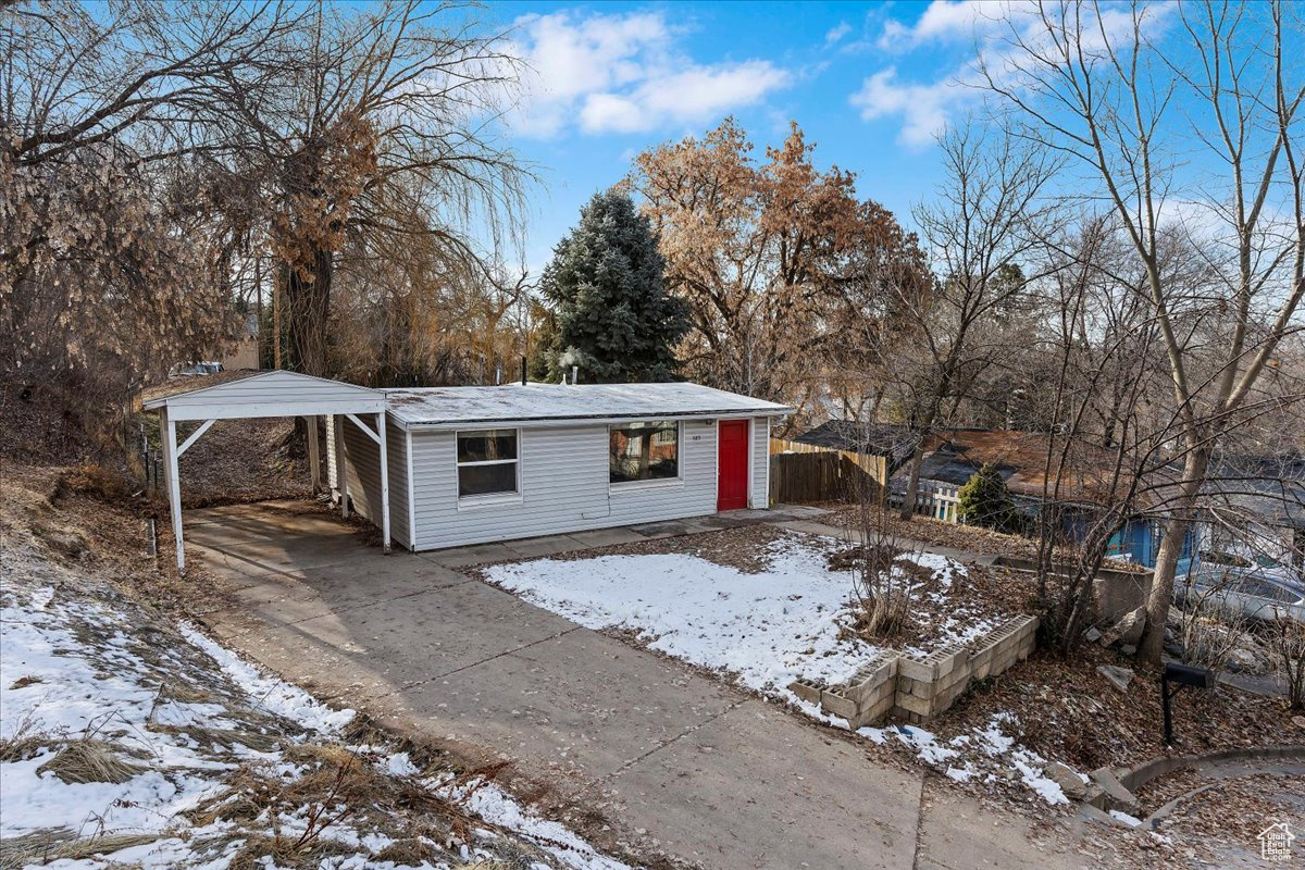 Exterior space with a carport