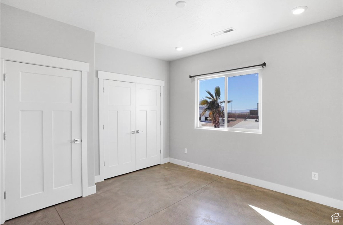 Unfurnished bedroom featuring a closet
