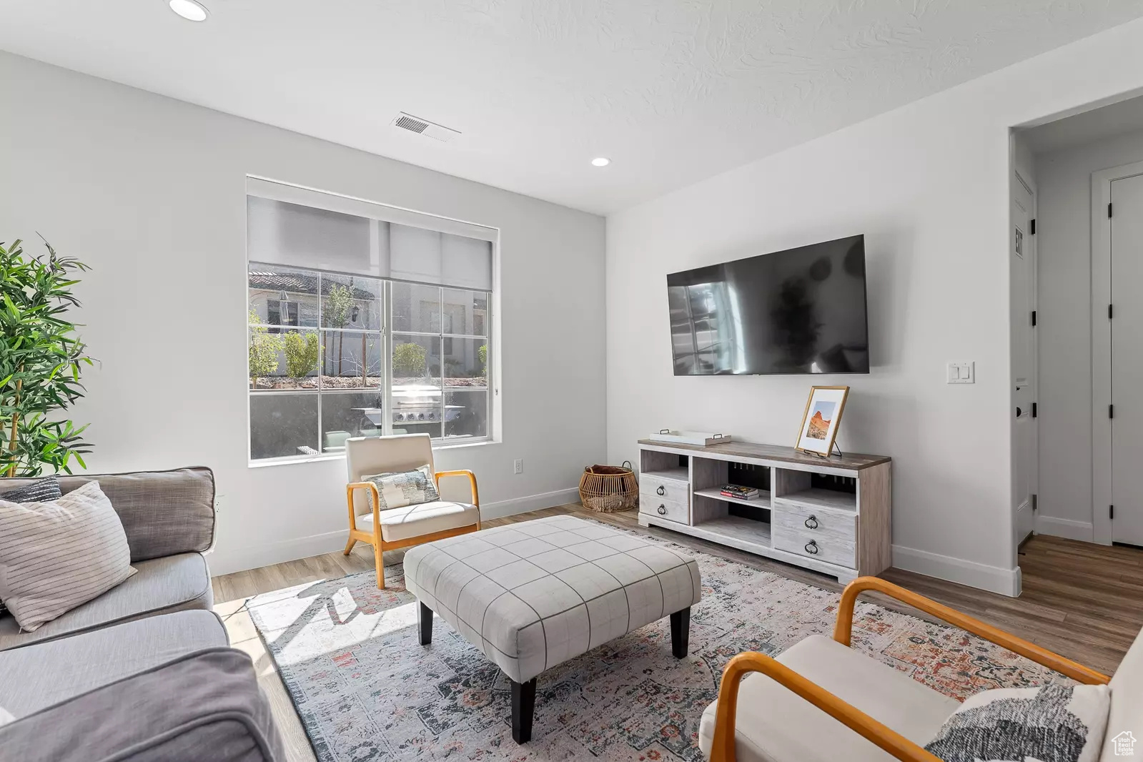 Living room featuring light hardwood / wood-style floors