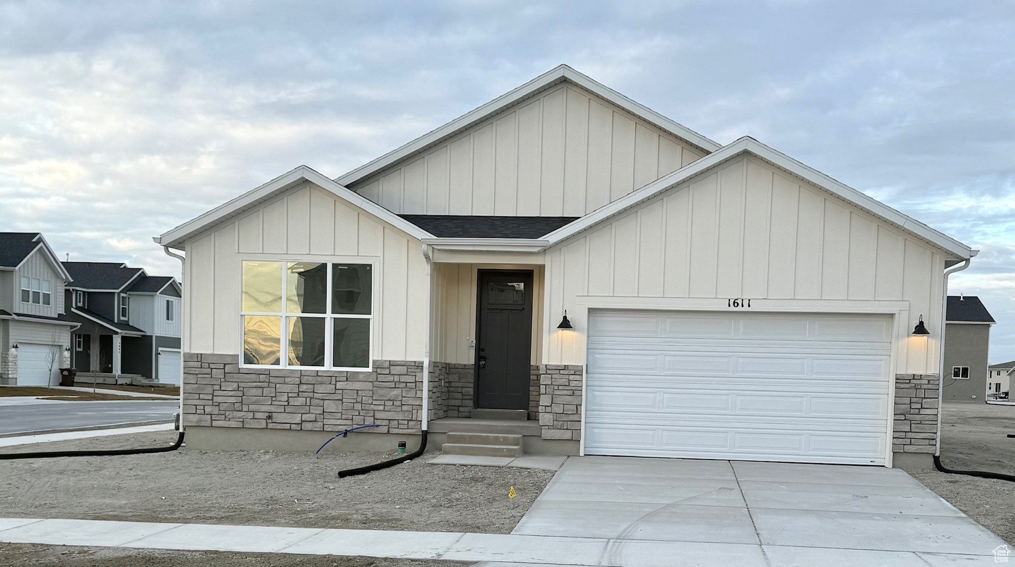 View of front of property with a garage