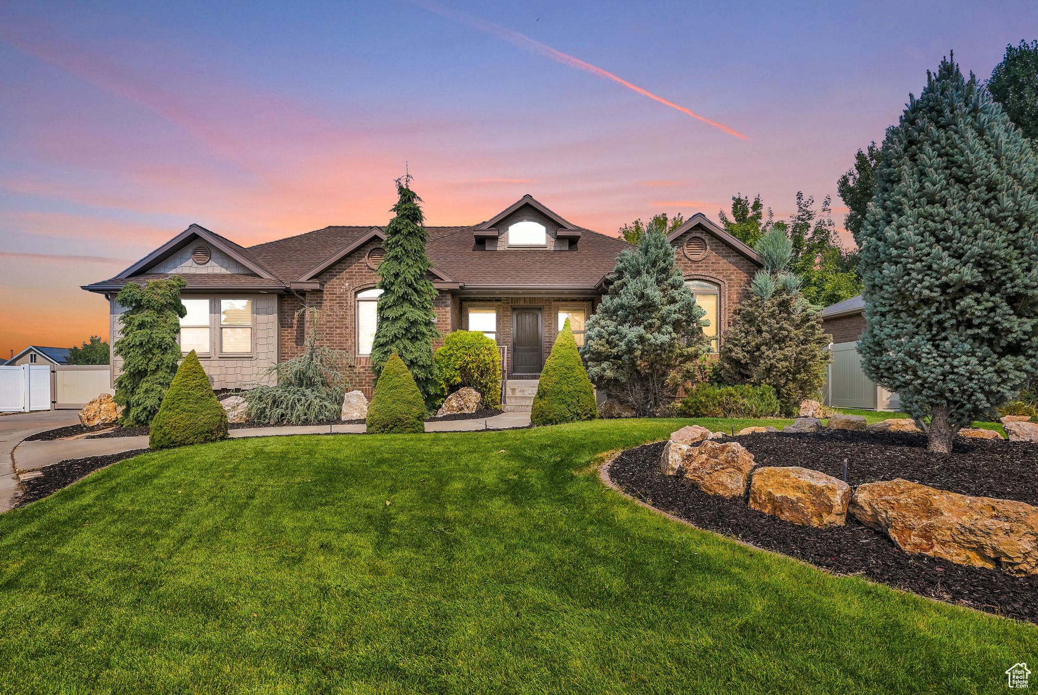 View of front of home with a yard