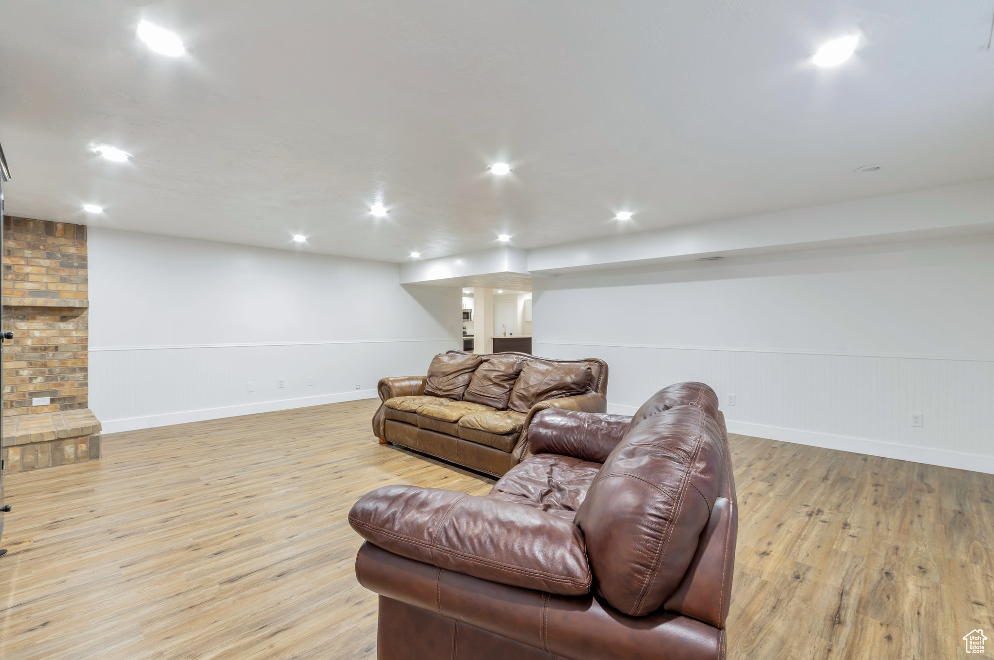 Living room with light wood-type flooring