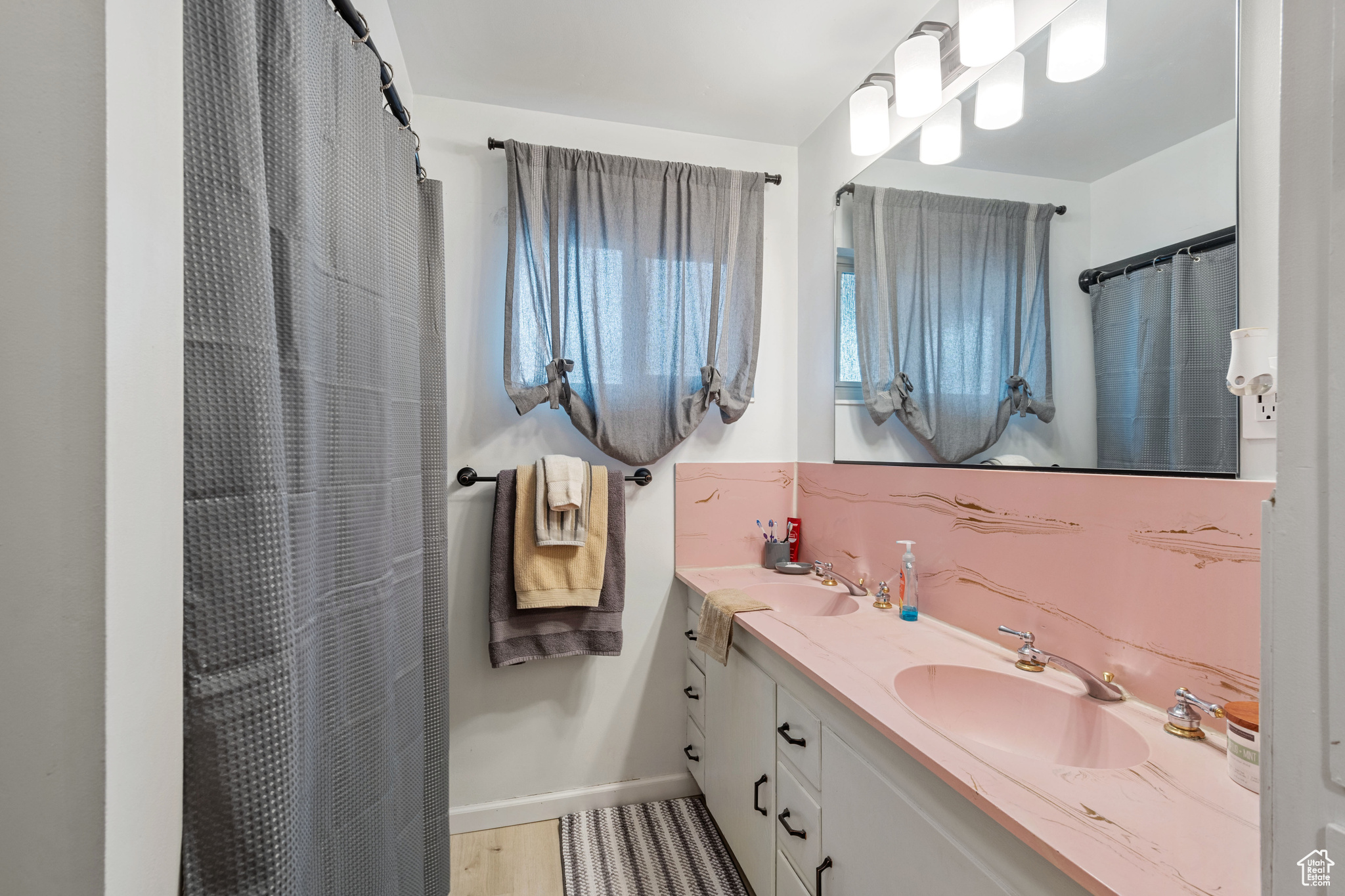 Main level bathroom with double vanity