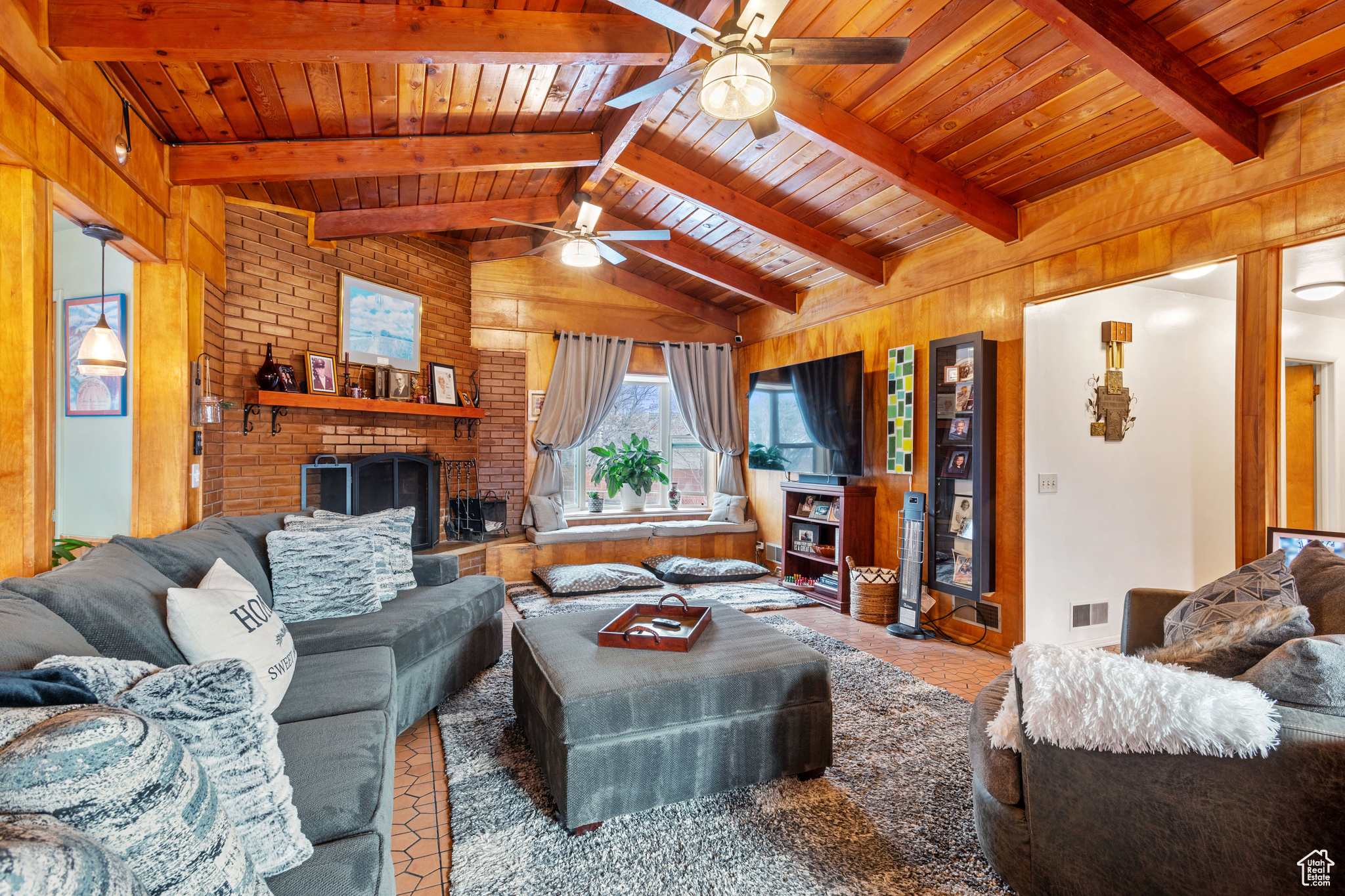 Living room with lofted ceiling and wooden beams