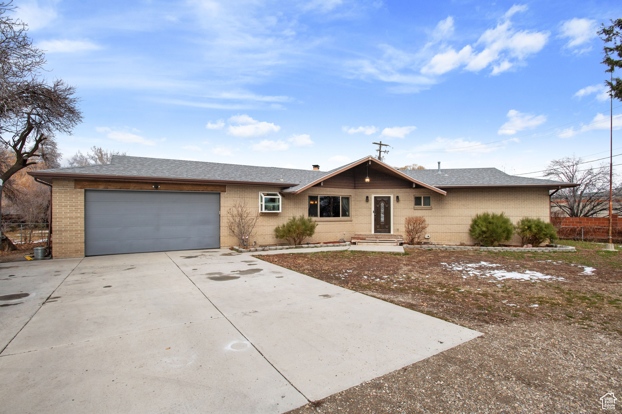 Rambler-style home with attached garage