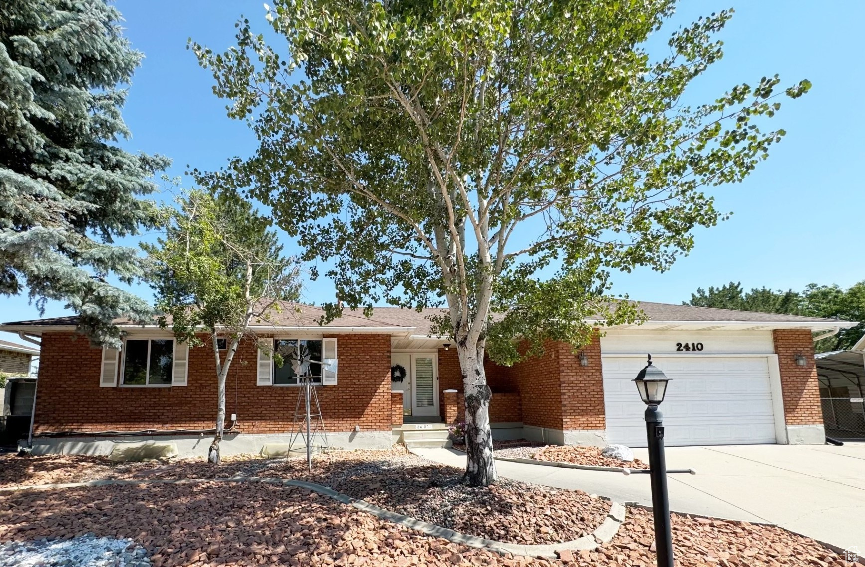 Single story home with a garage